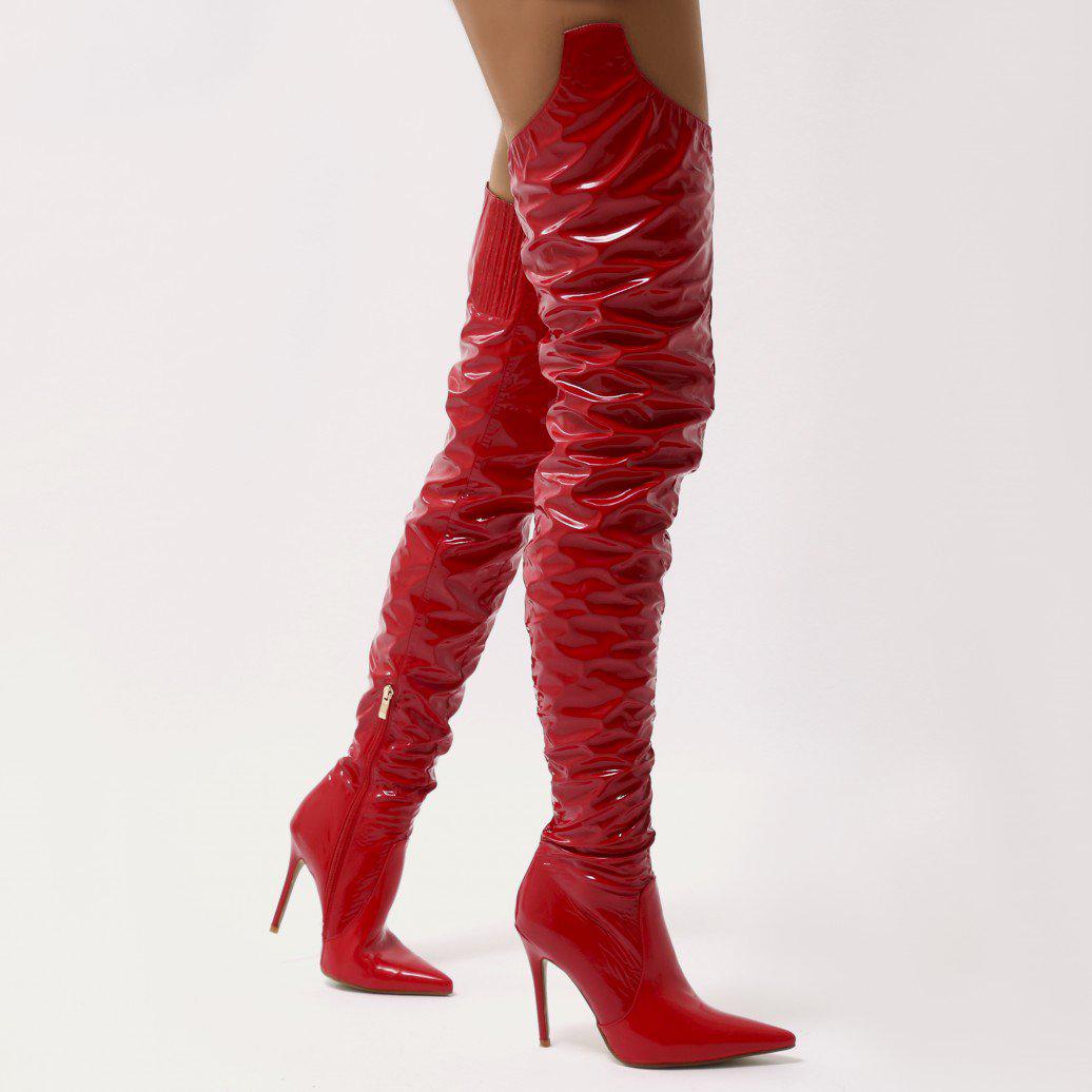 red vinyl thigh high boots