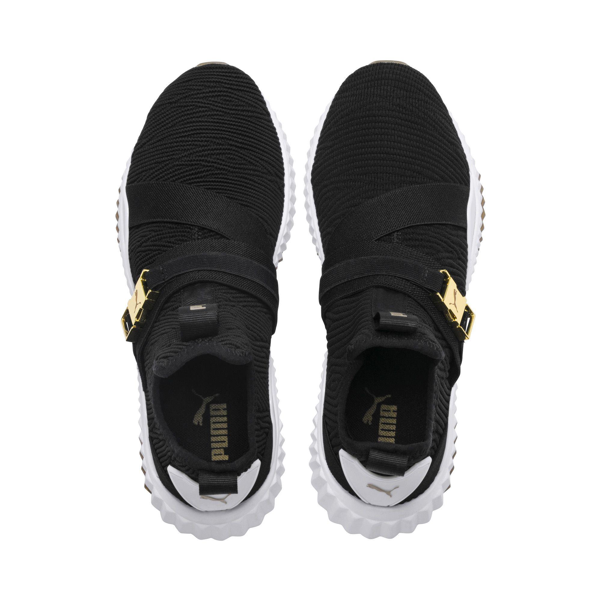 puma defy mid varsity noir