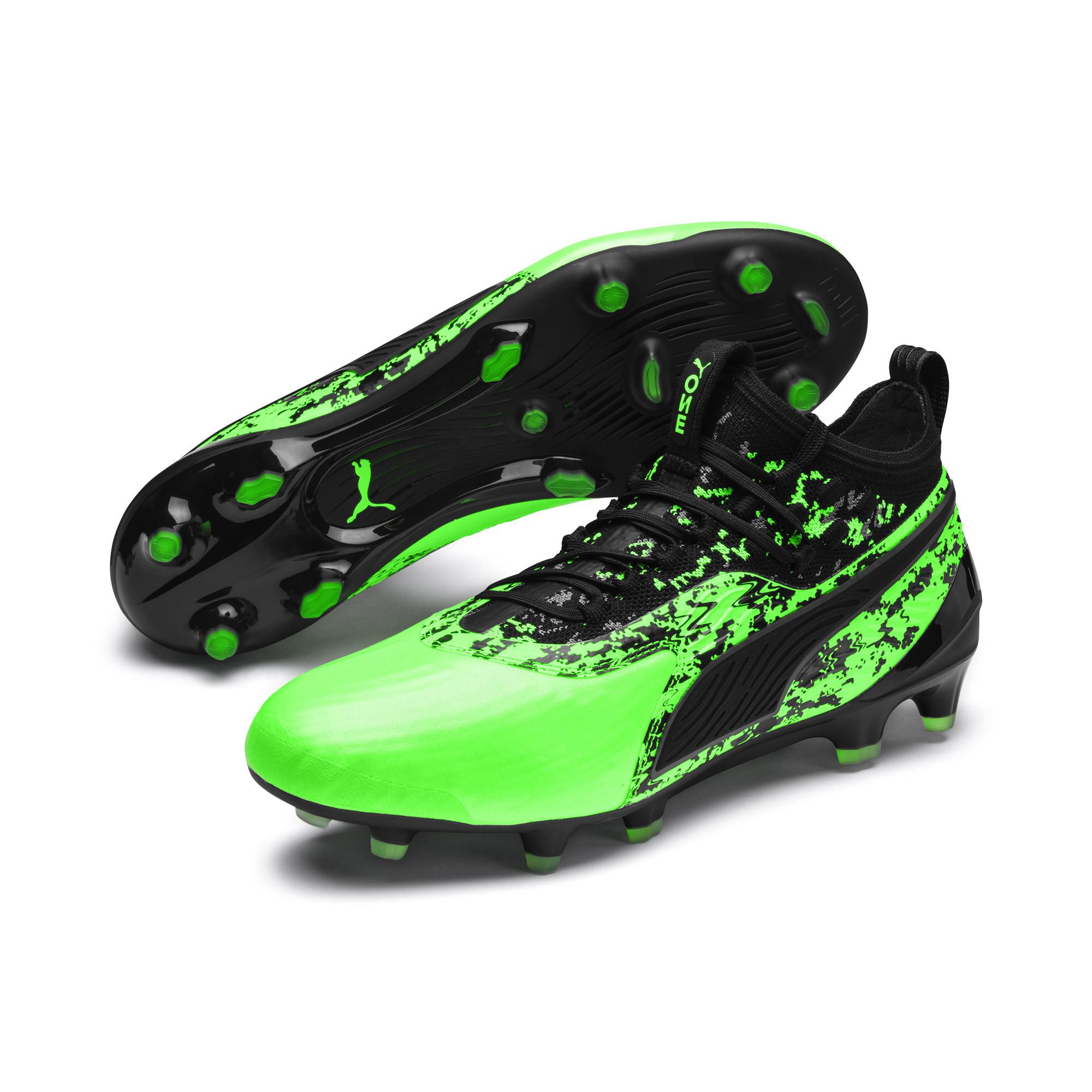 puma green and black boots
