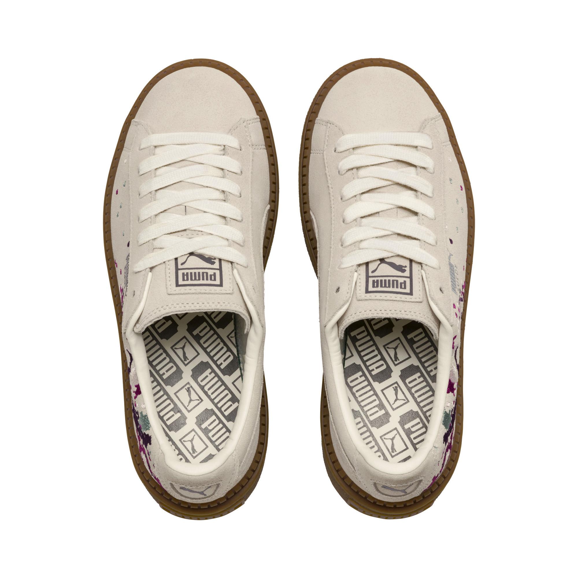 puma suede platforms in white with embroidery