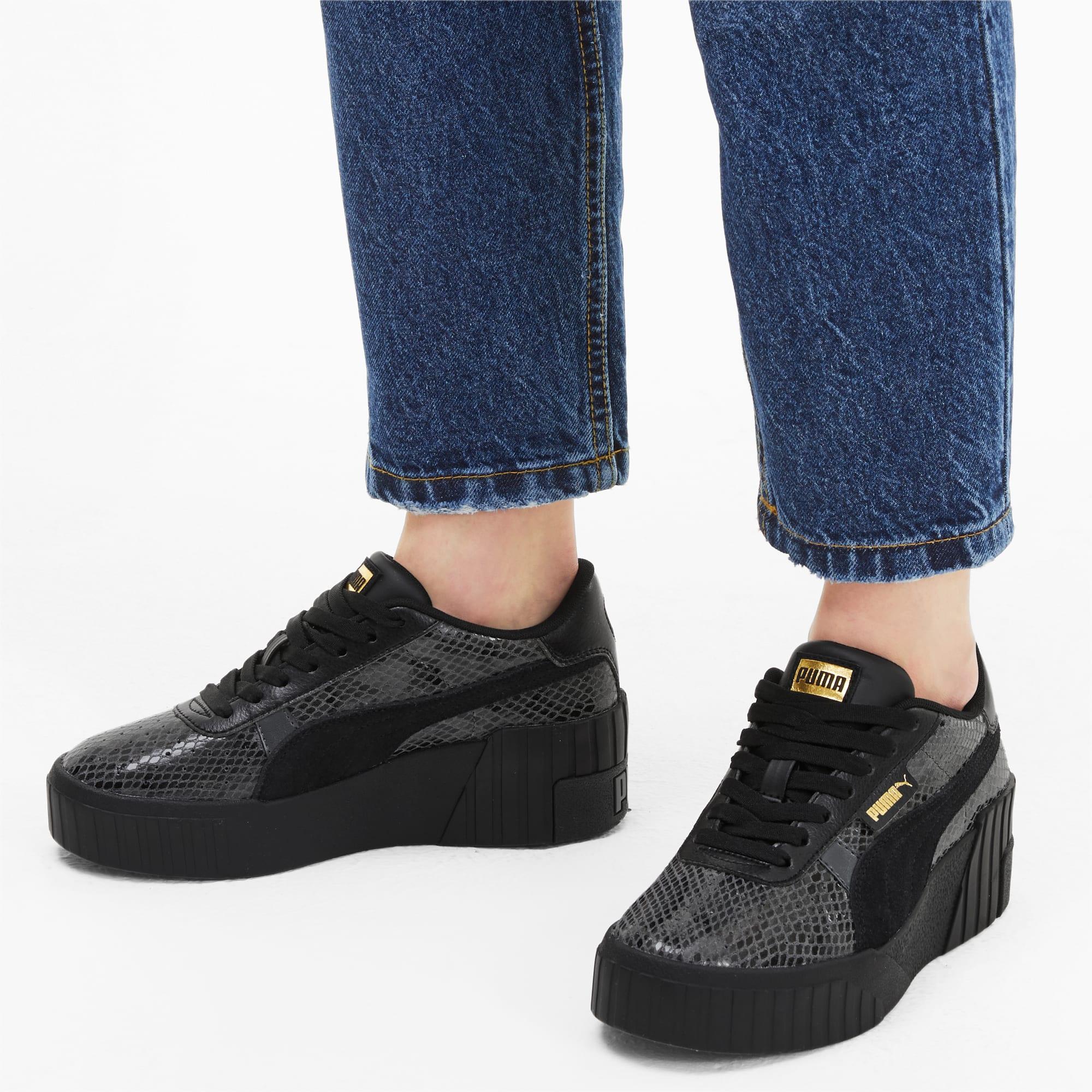 PUMA Cali Wedge Snake in Black | Lyst