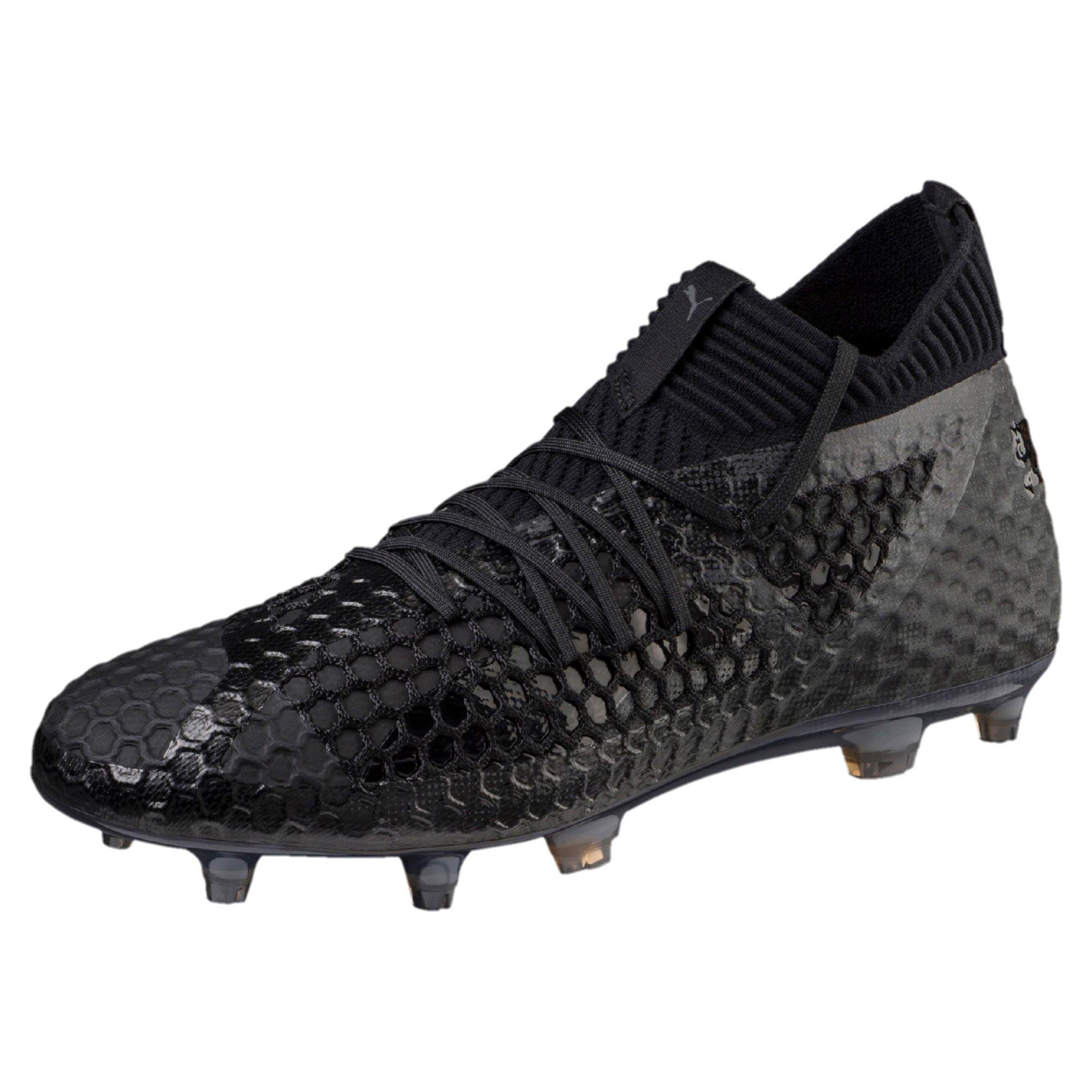black puma soccer cleats