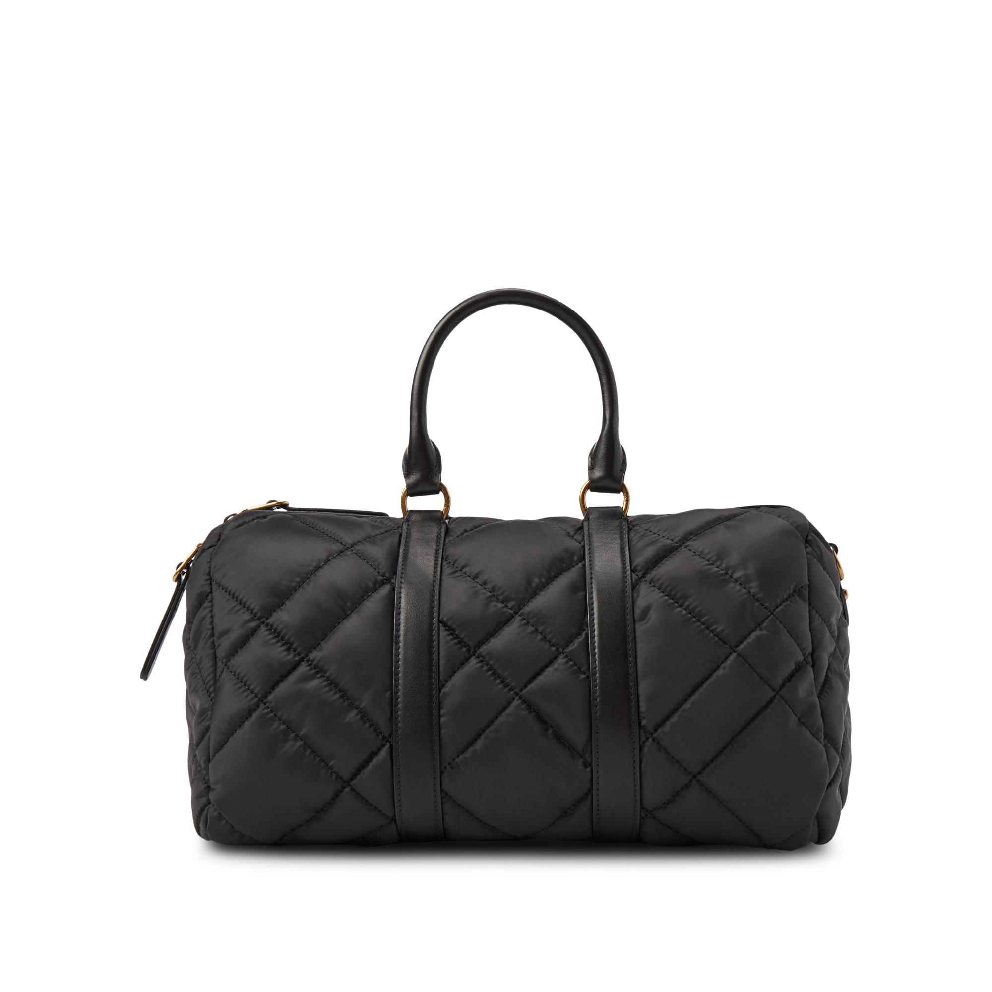 Chanel Vintage White Quilted Leather Black Logo Duffle Bag at 1stDibs