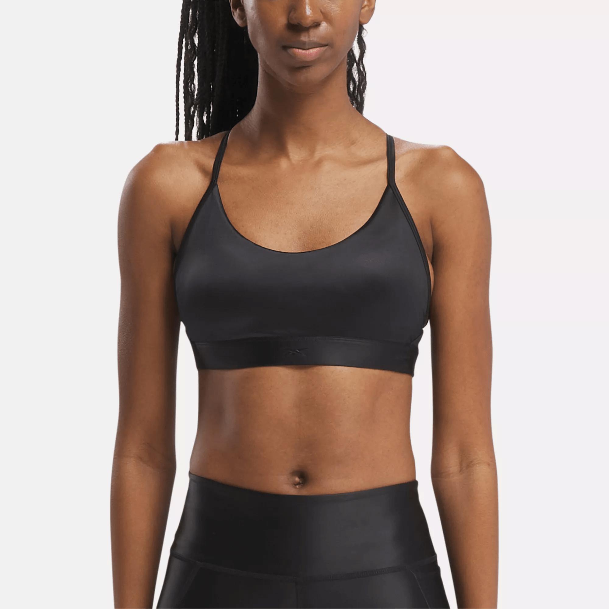 Reebok Lux Shine Strappy Bra in Black | Lyst