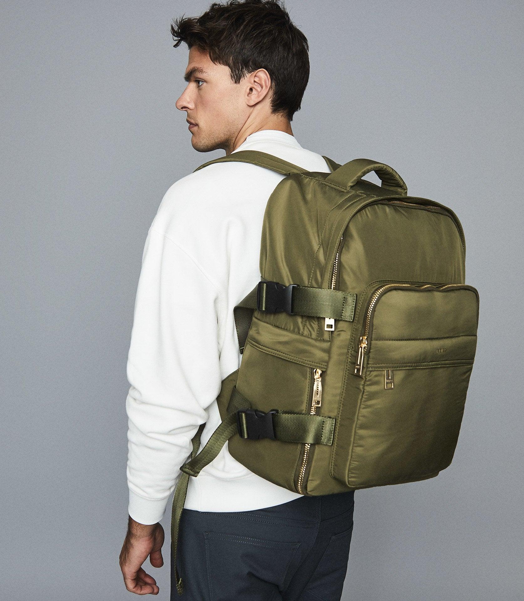 green nylon backpack
