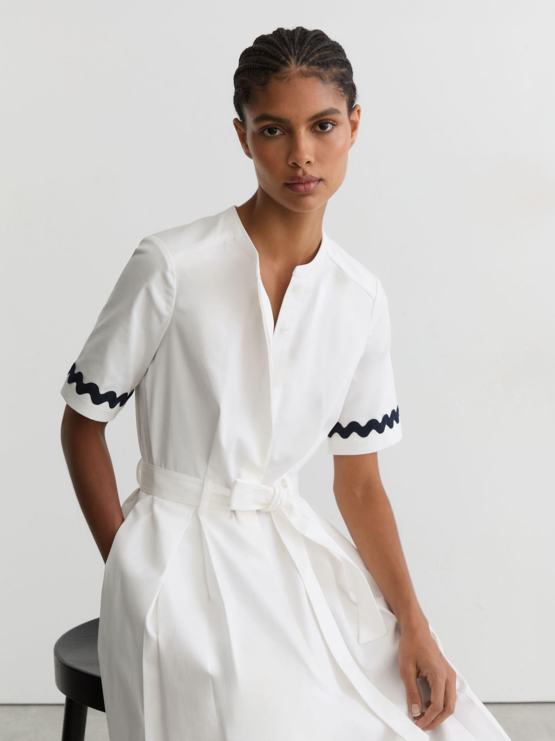reiss white dress Atelier Layered Fringe Mini in this Reiss midi dress features a sophisticated round neck and sleeveless design Reiss Atelier Cut-Out Rope-Detail Dress