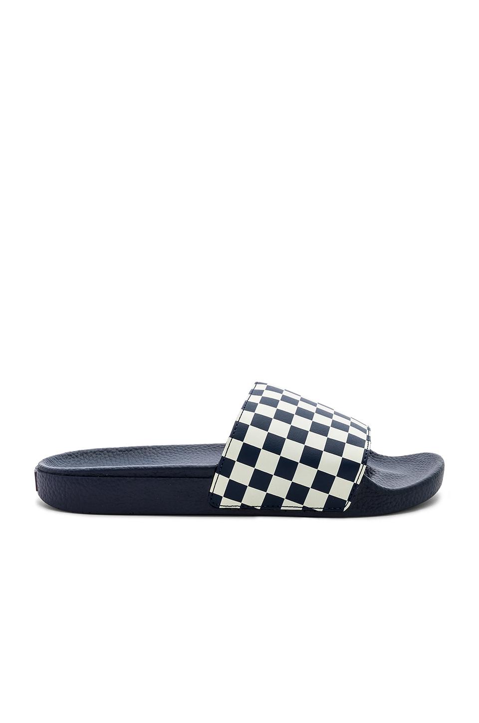 slide on checkerboard vans