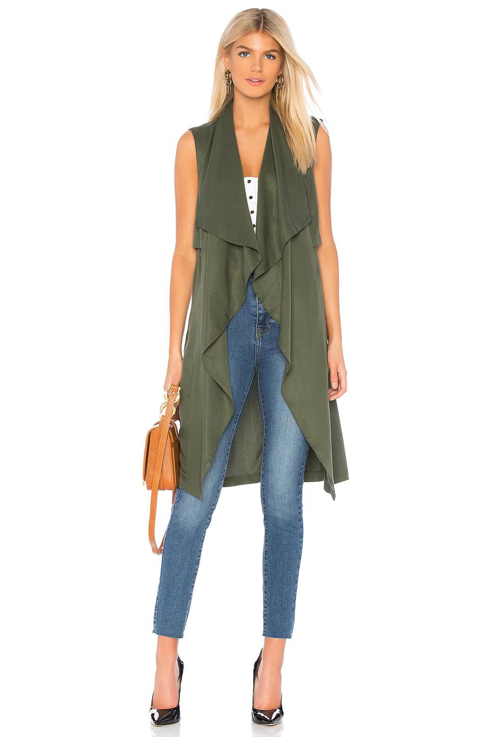 cupcakes and cashmere vest
