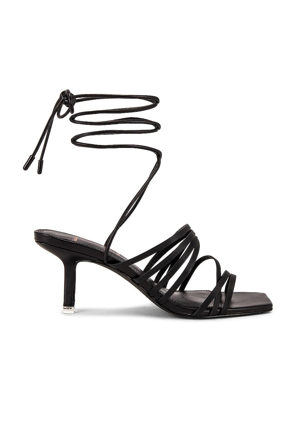 black suede studio heels