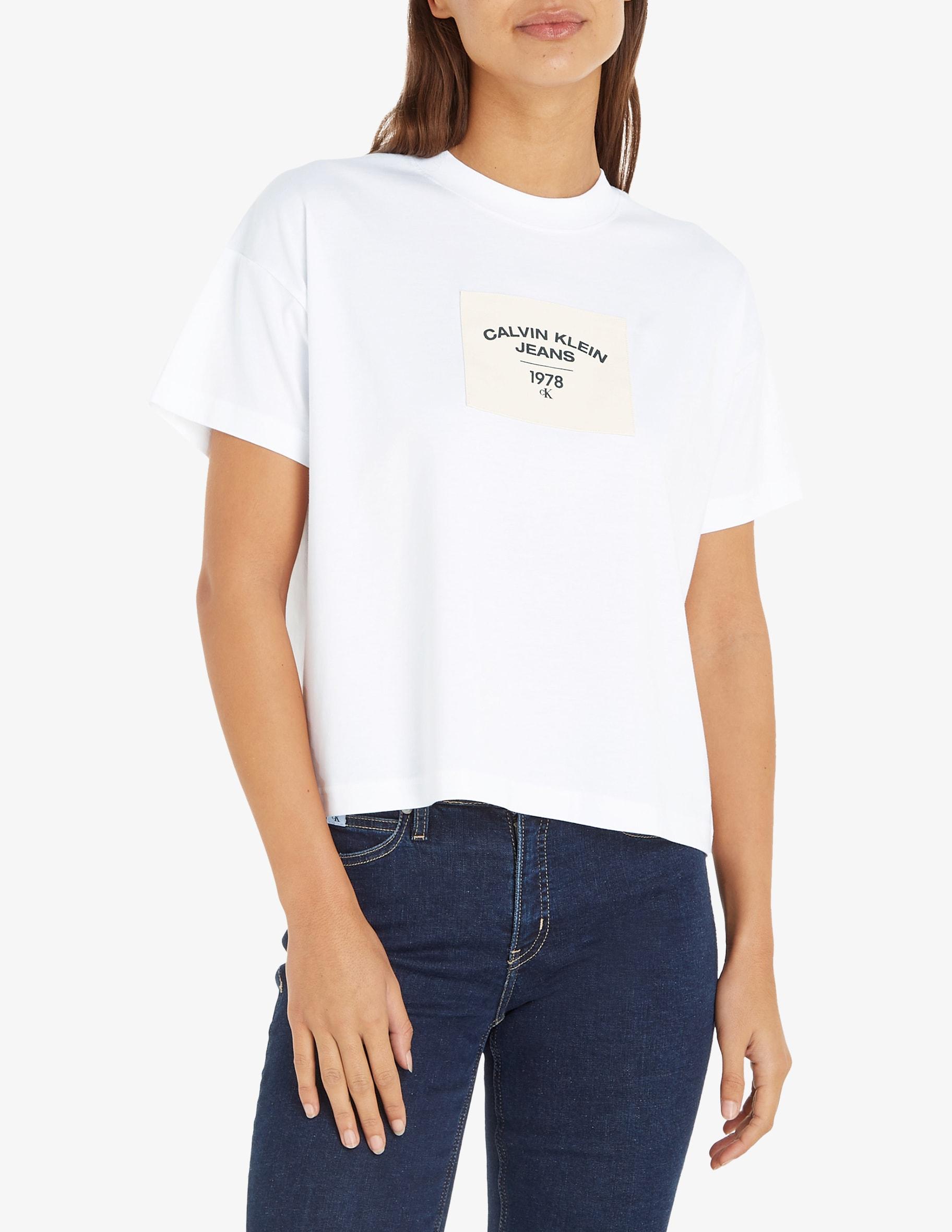 T-shirt con toppe in tela di Calvin Klein in Bianco | Lyst