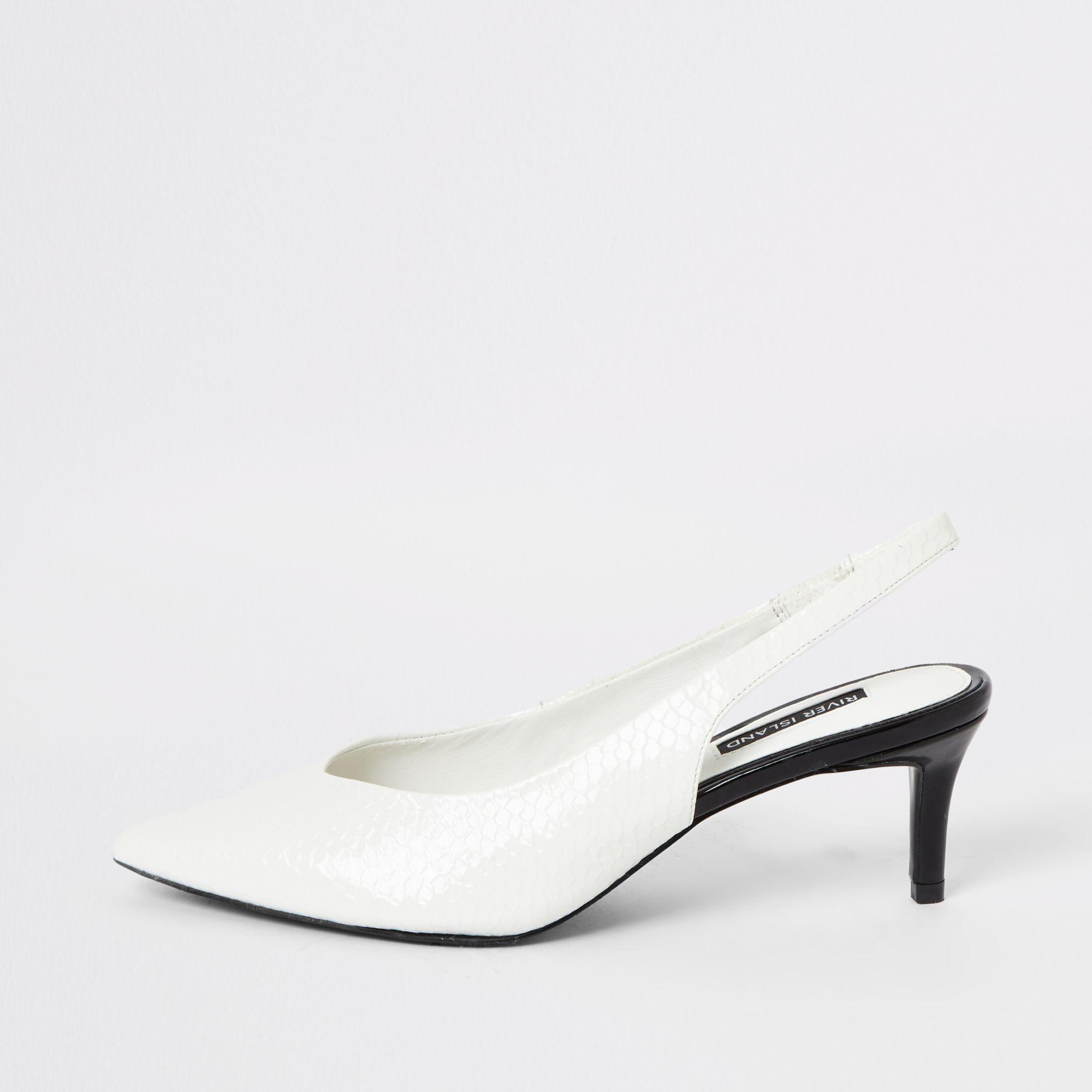 white slingback kitten heels