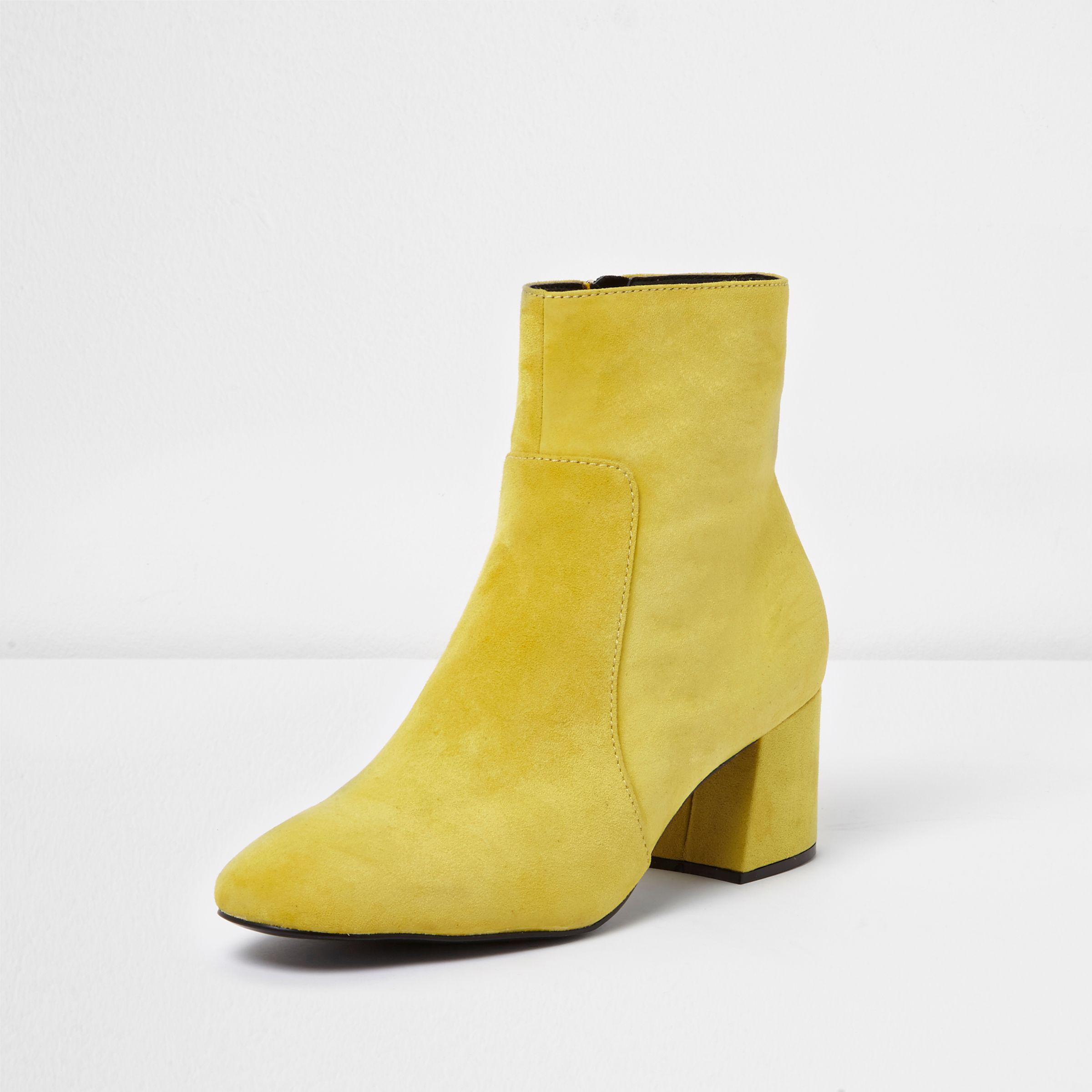 yellow block heel boots