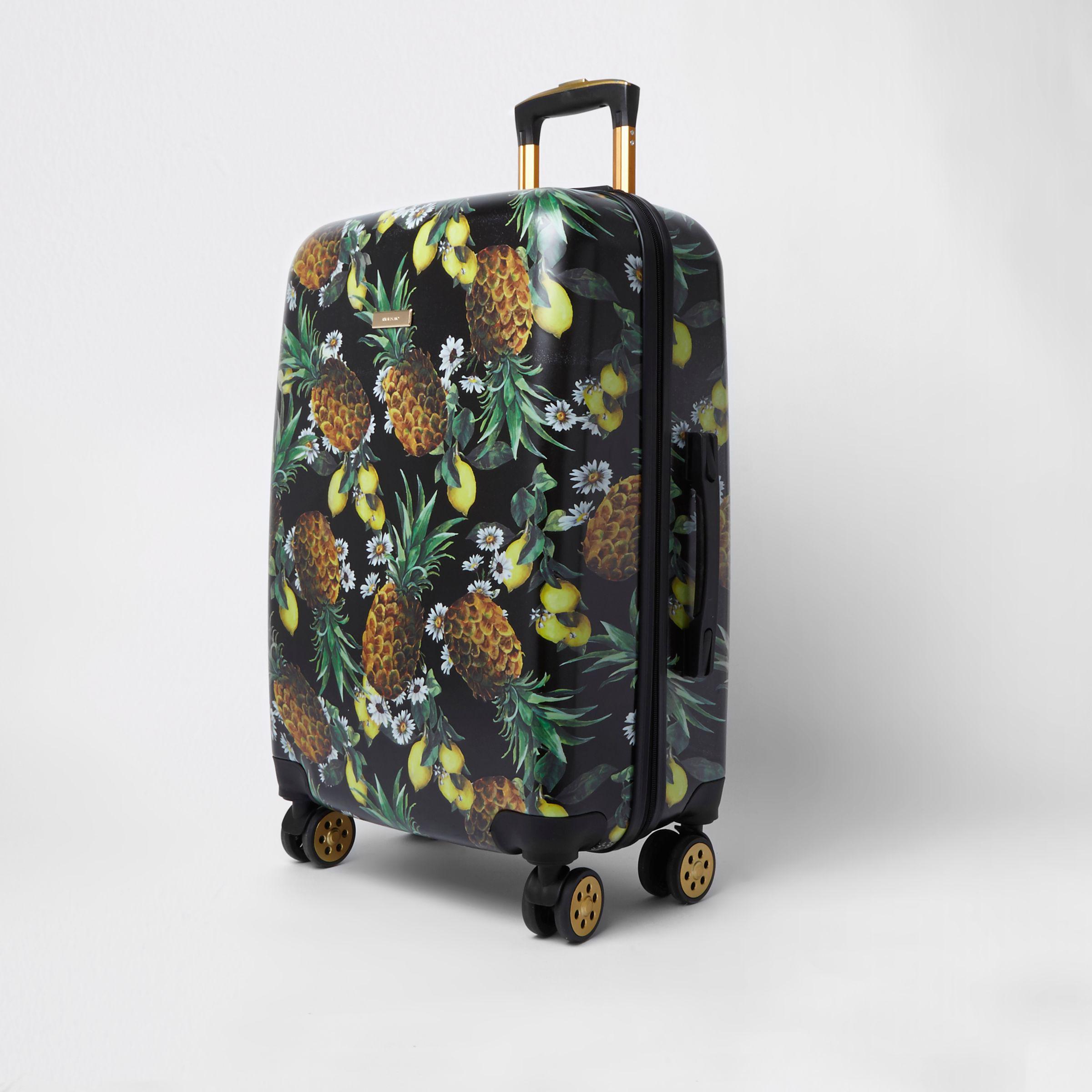 large four wheel suitcase