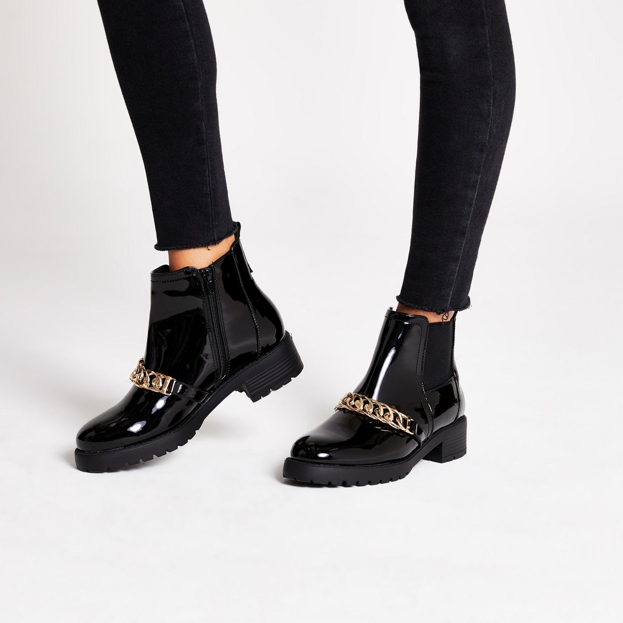 black chain ankle boots