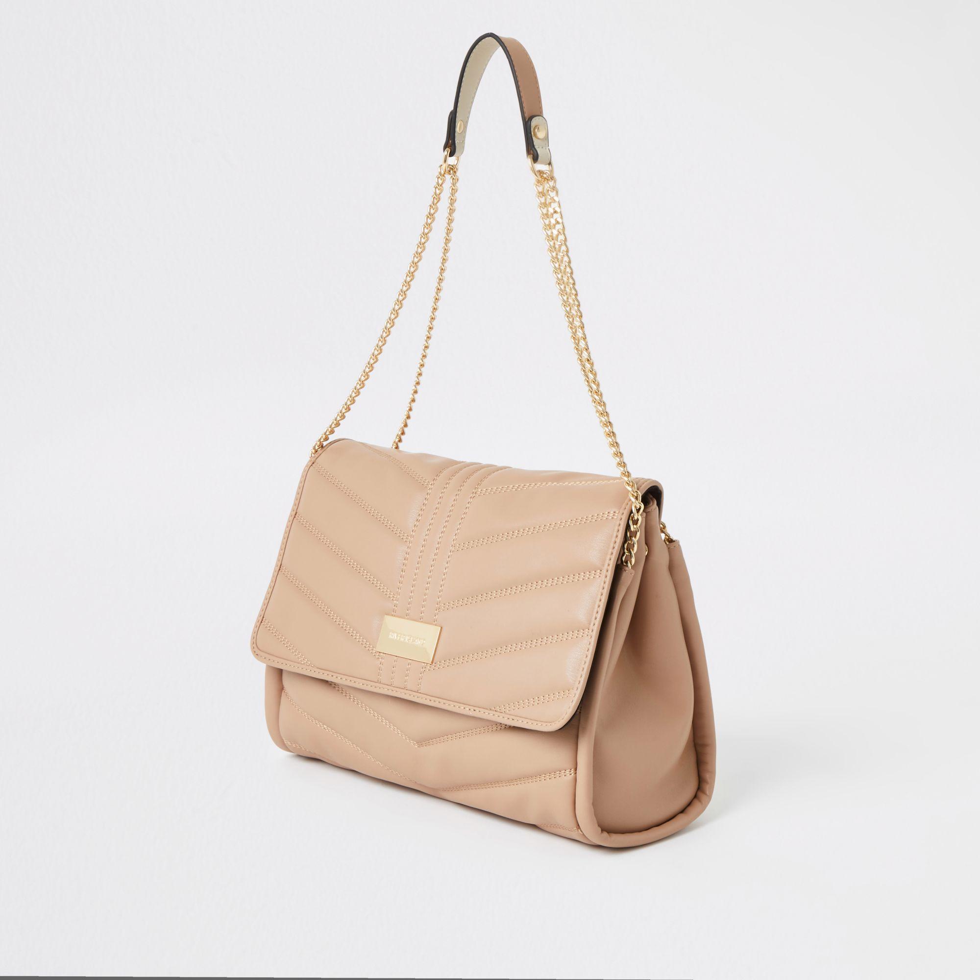 beige quilted bag