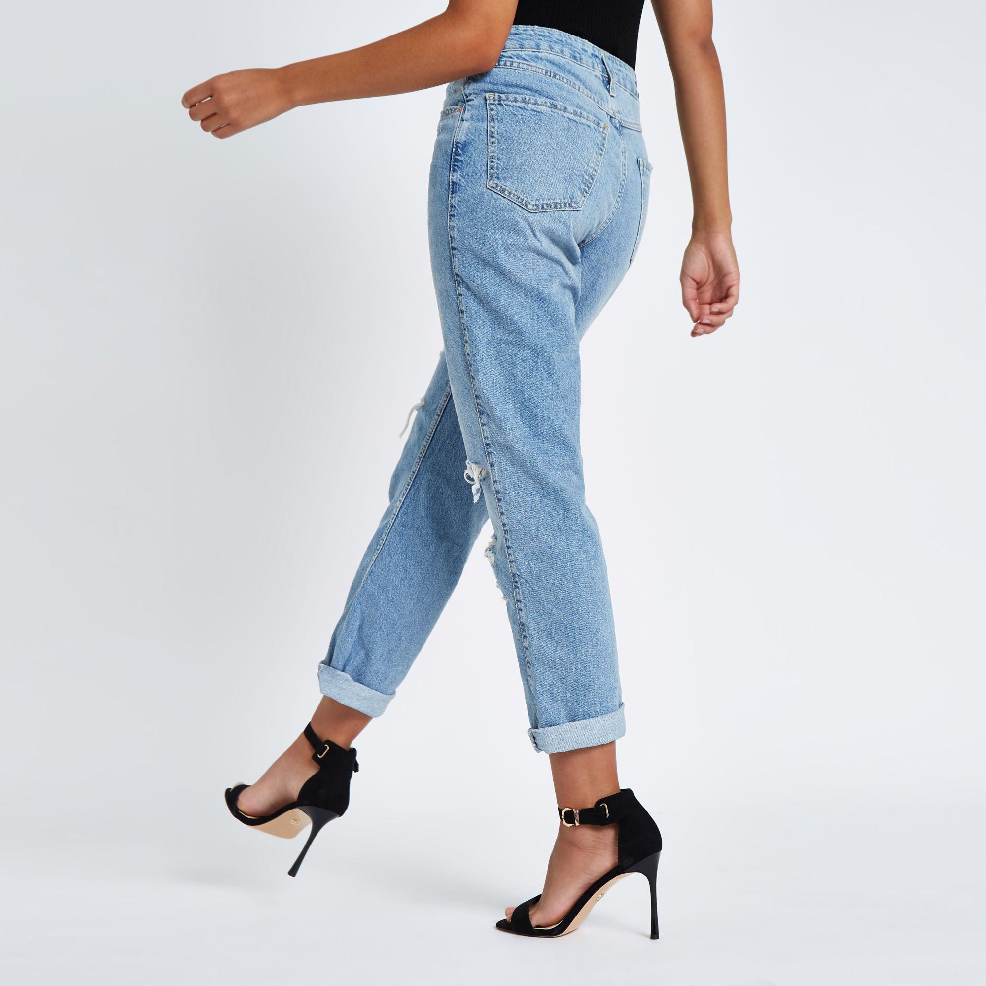 mid blue high rise mom fit ripped jeans