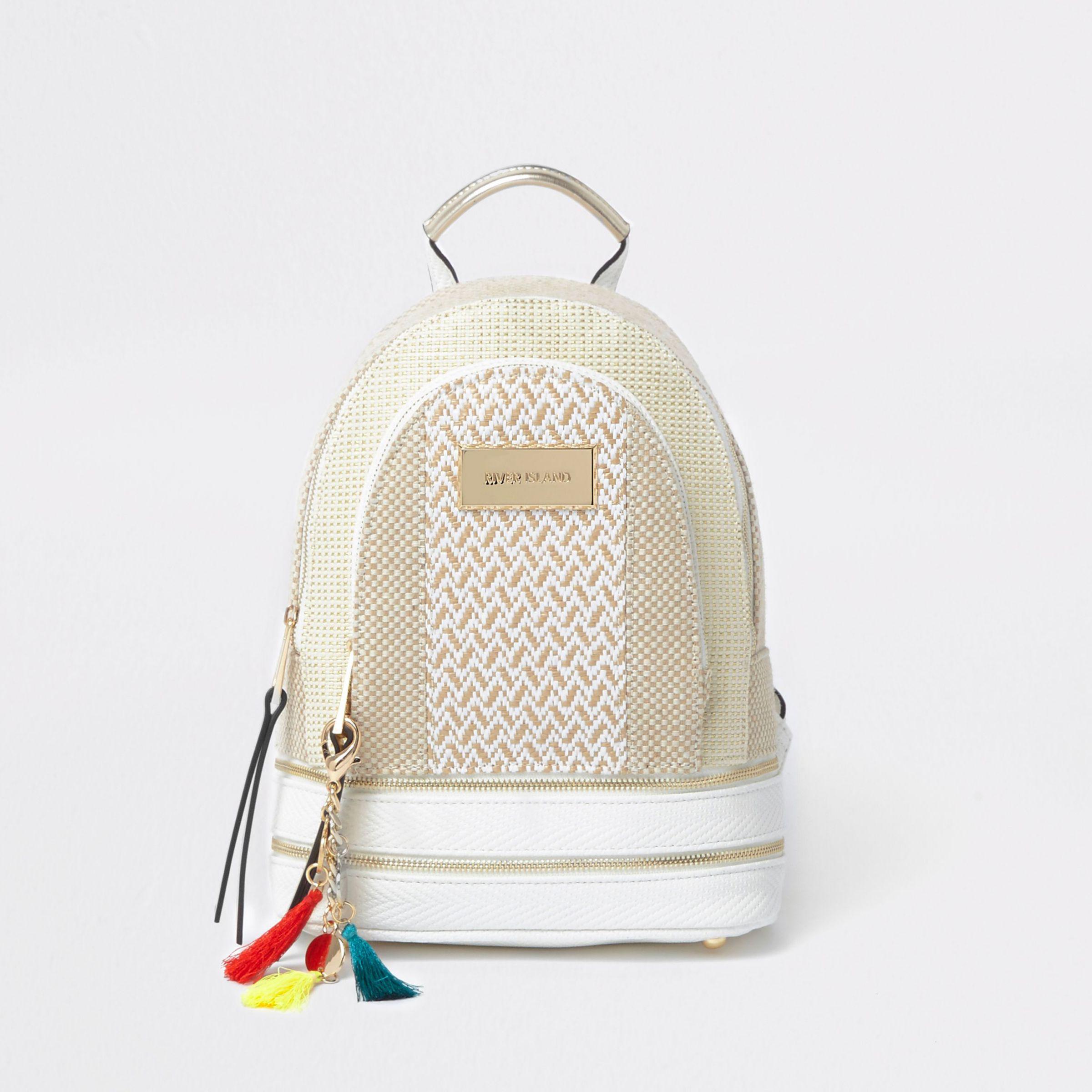 beige mini backpack