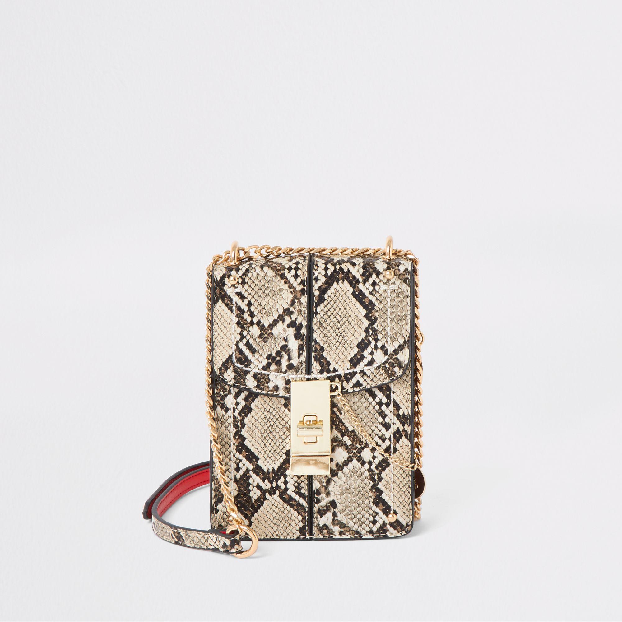 beige snake print bag
