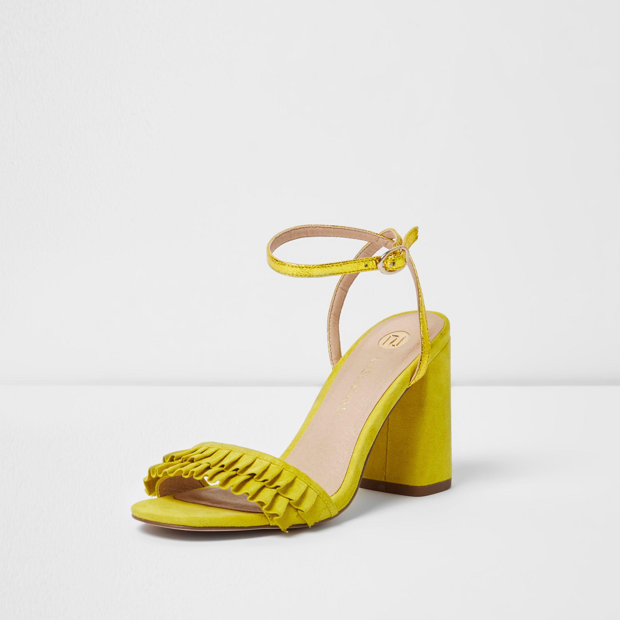 yellow frill heels