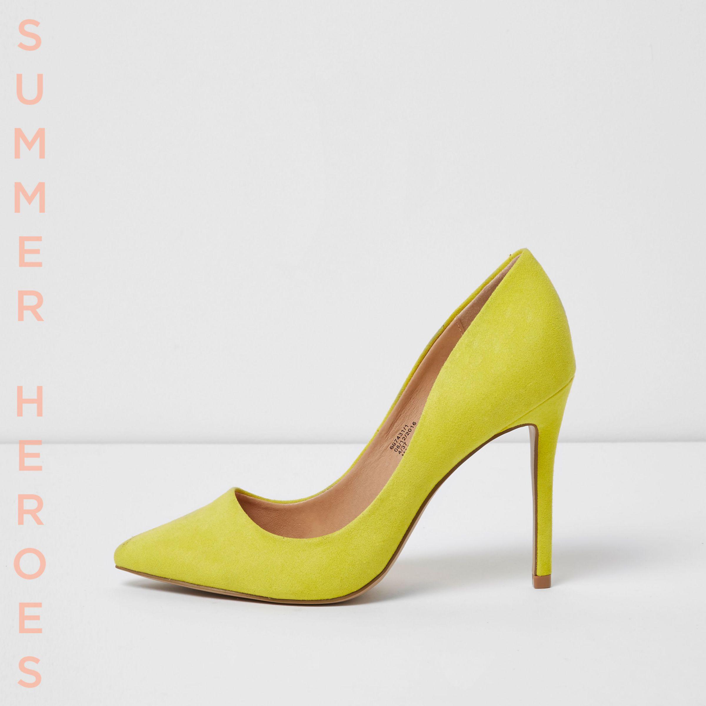 grey and red puma shoes