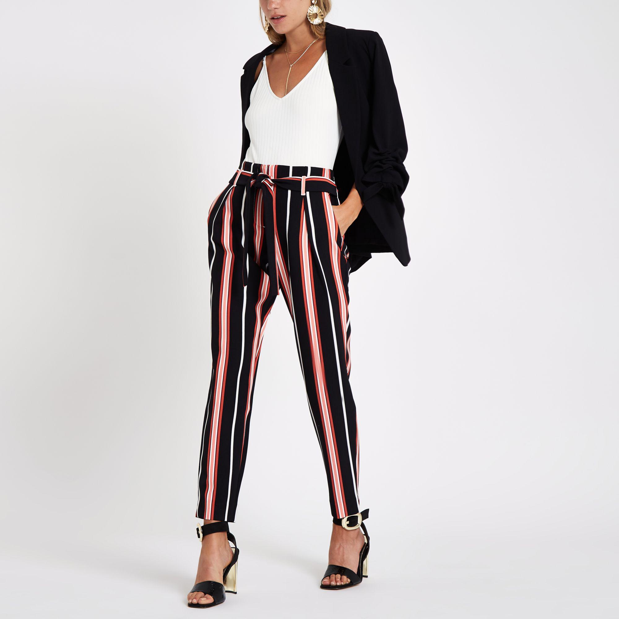 black trousers with red and white stripe