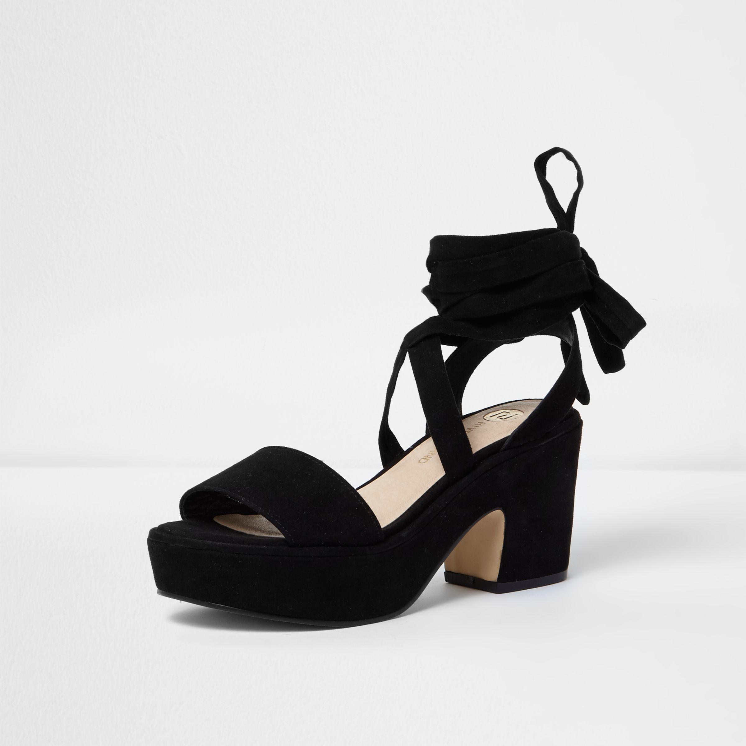 black platform tie sandals