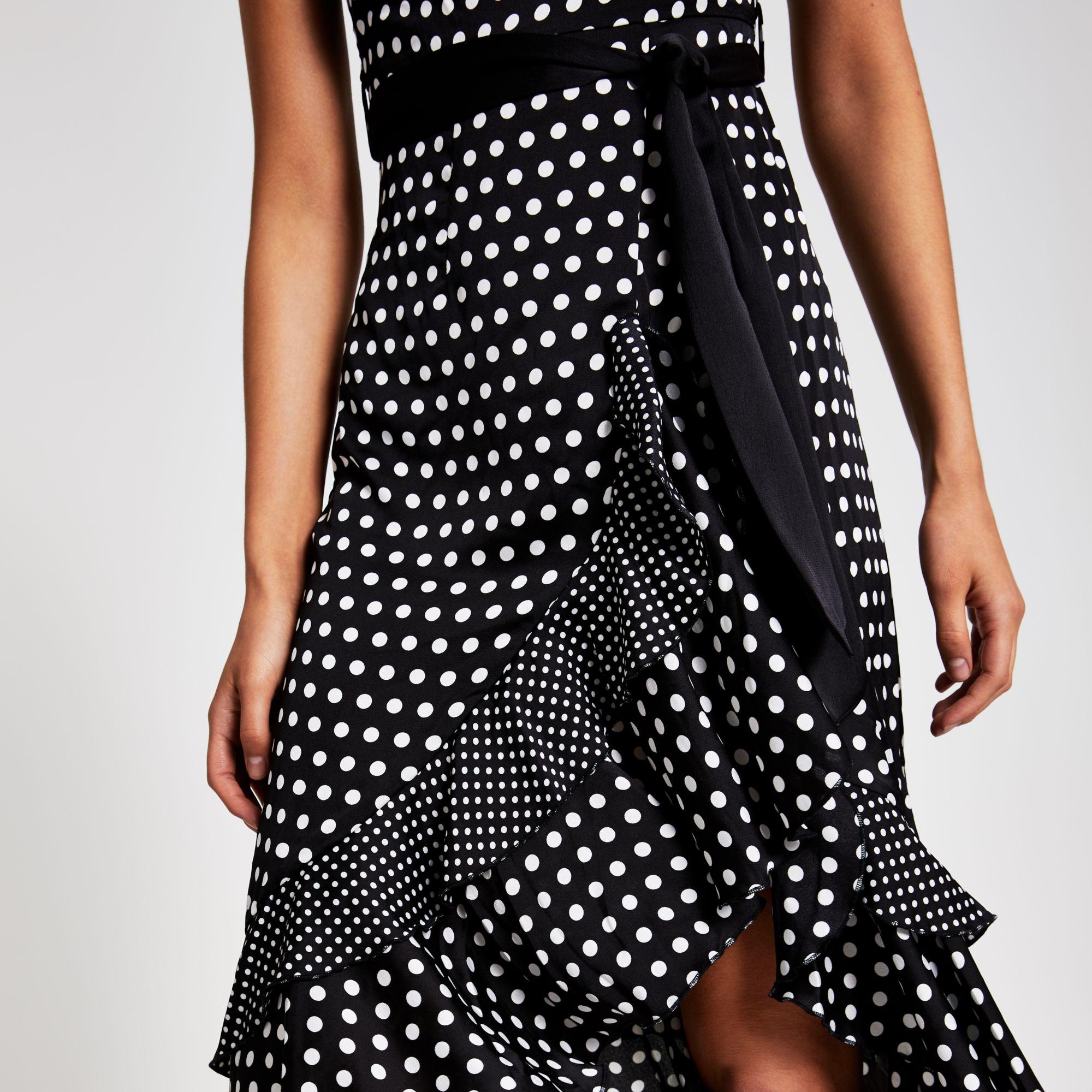 black dress with peplum waist