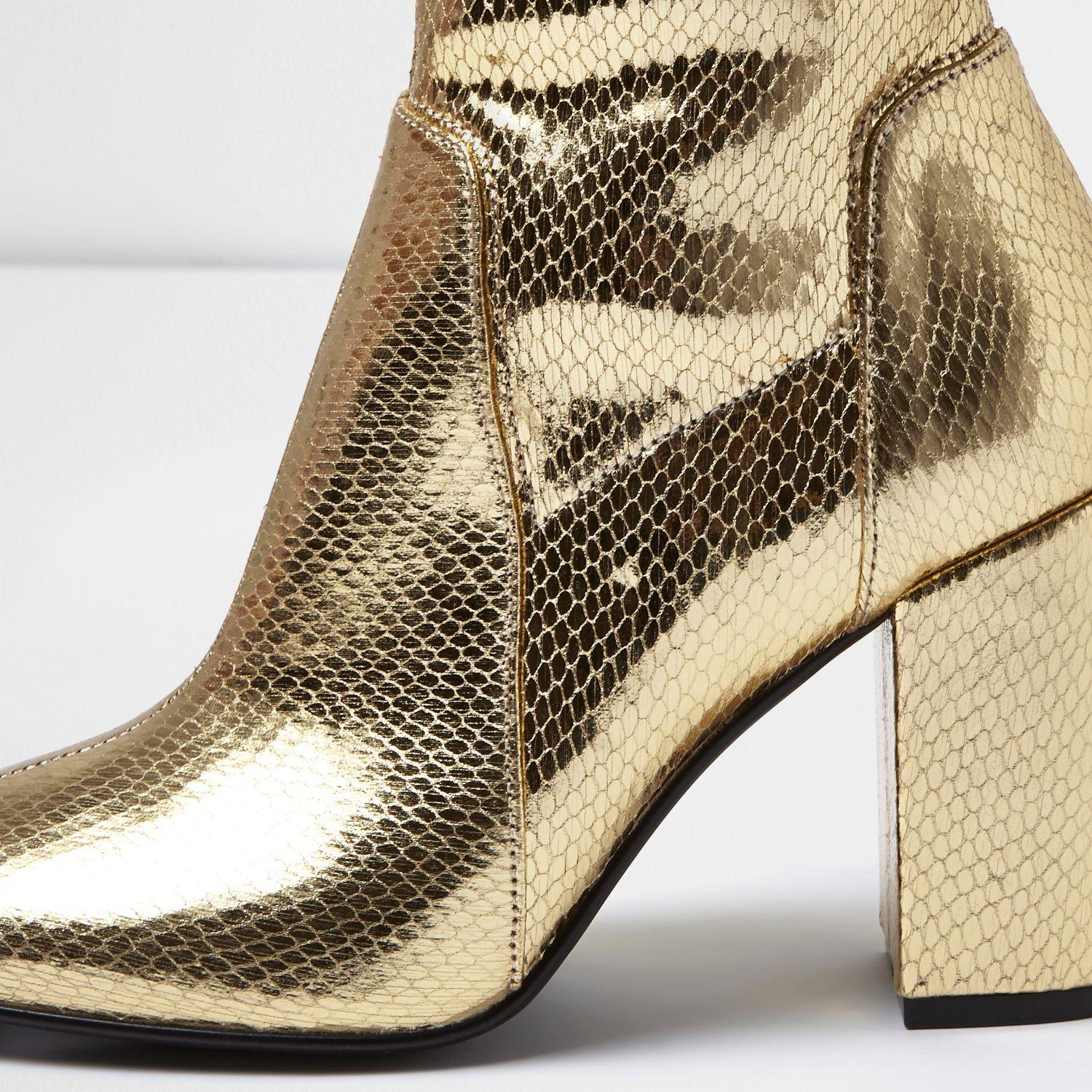 gold sock boots