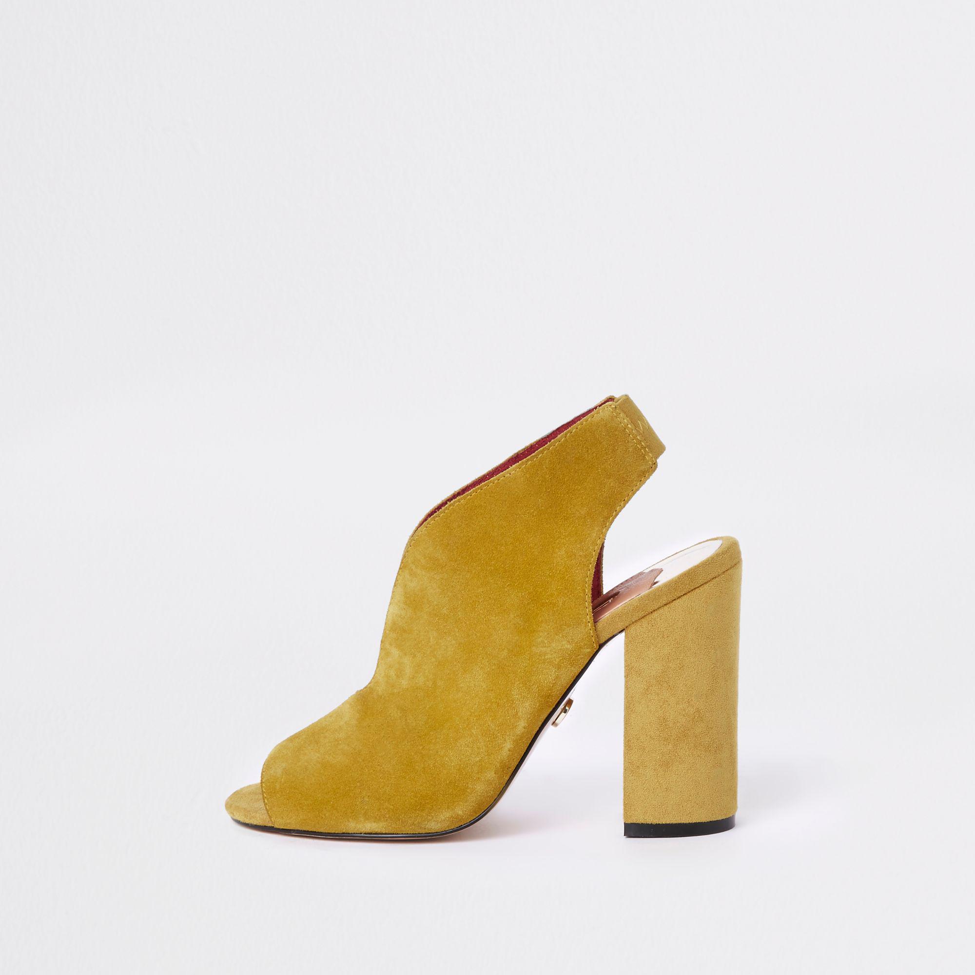 yellow block heel pumps