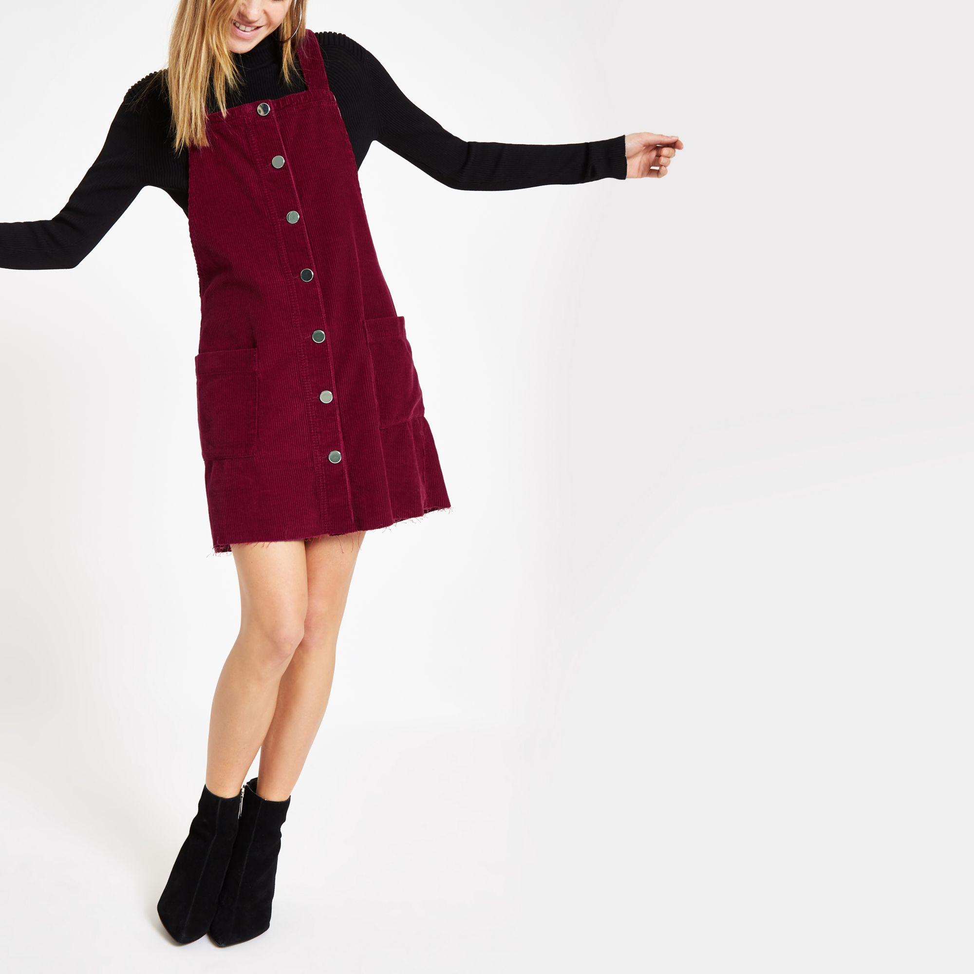 red corduroy dungaree dress