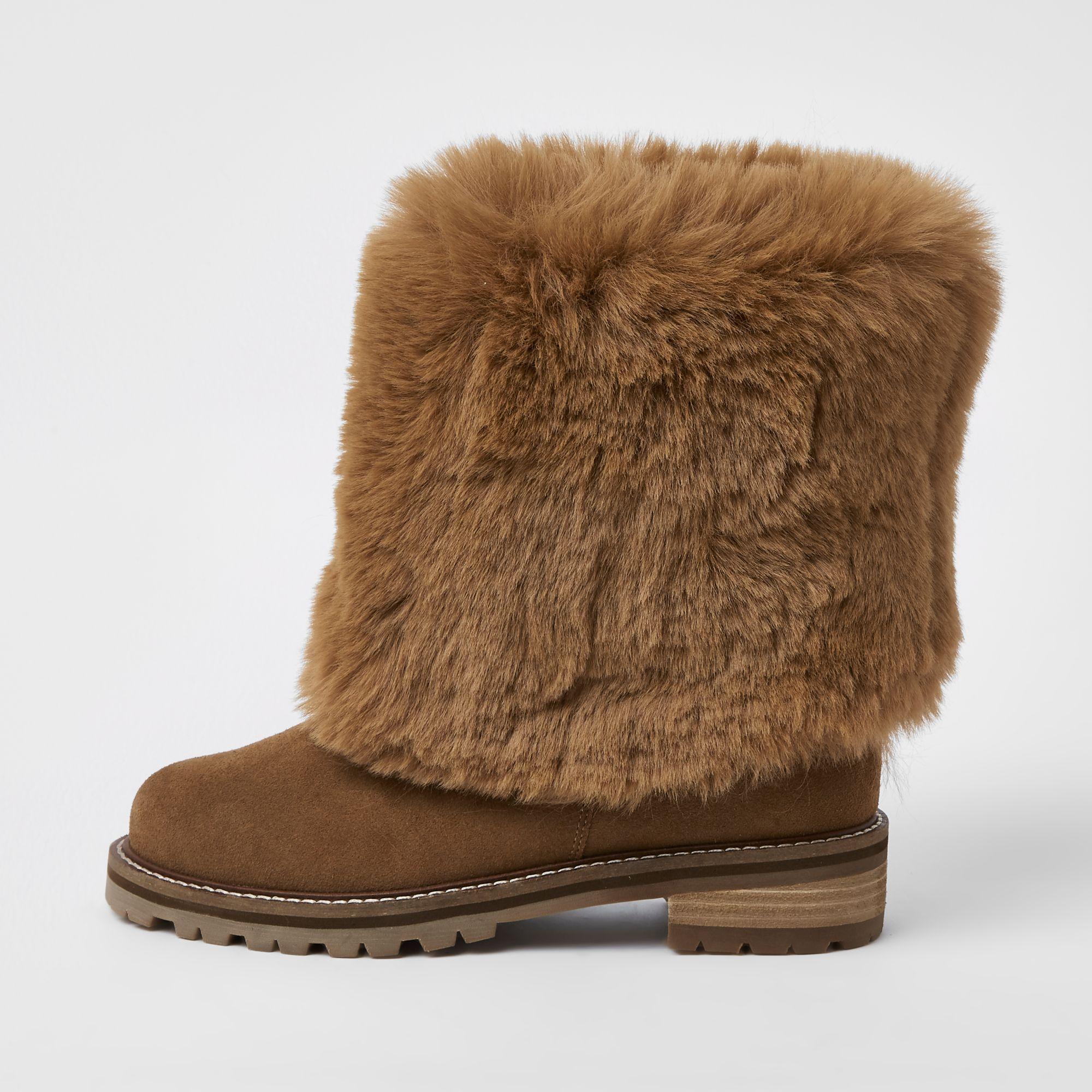 Buy > fluffy brown boots > in stock