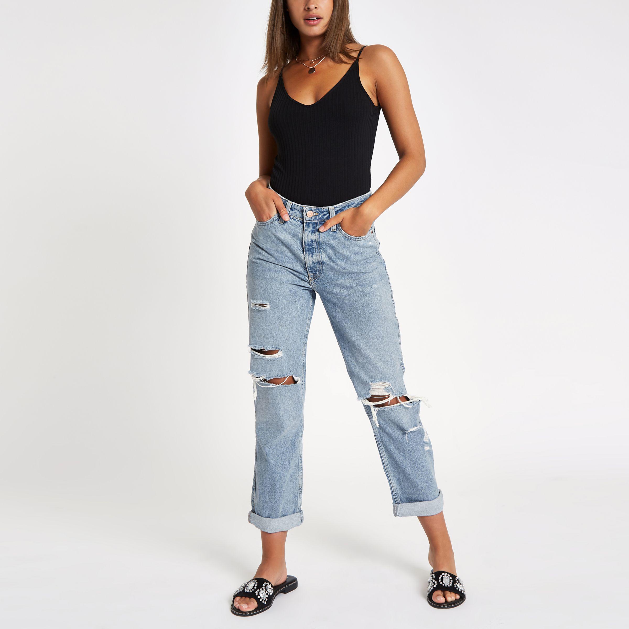 mid blue high rise mom fit ripped jeans