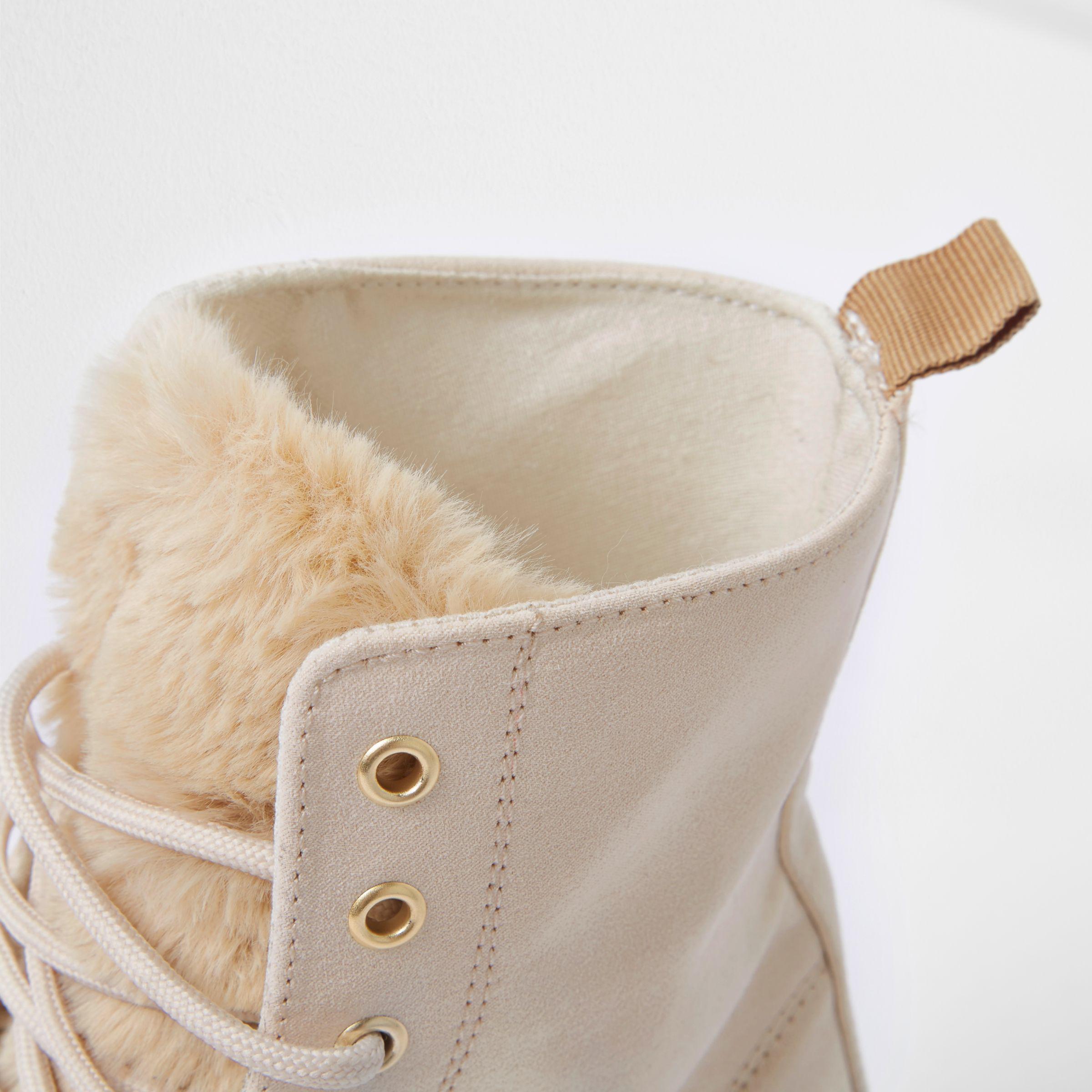 cream boots with fur