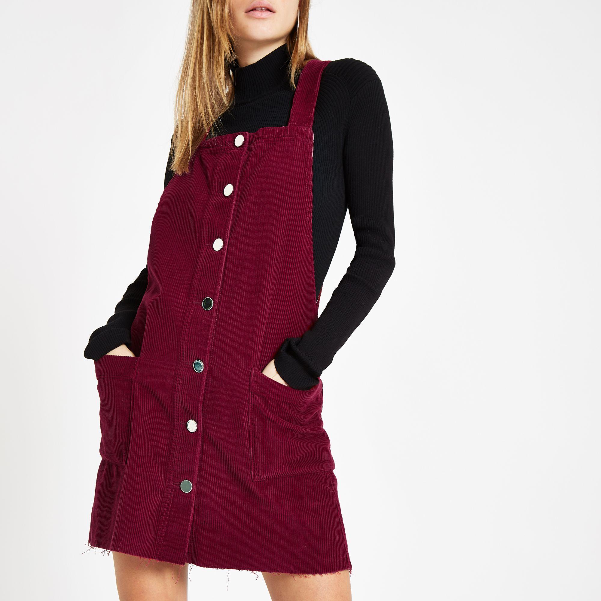 red corduroy dungaree dress