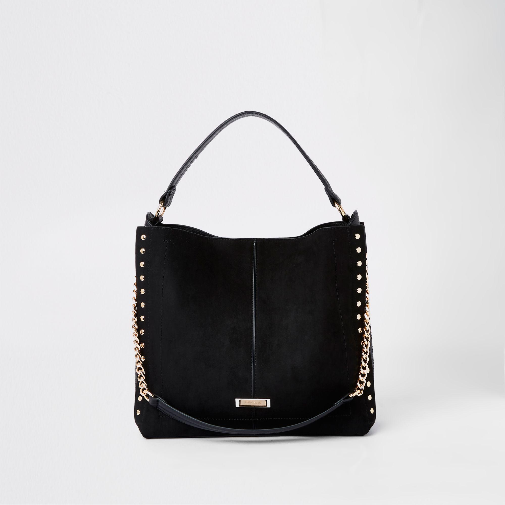 River Island Studded Side Slouch Bag in Black | Lyst UK