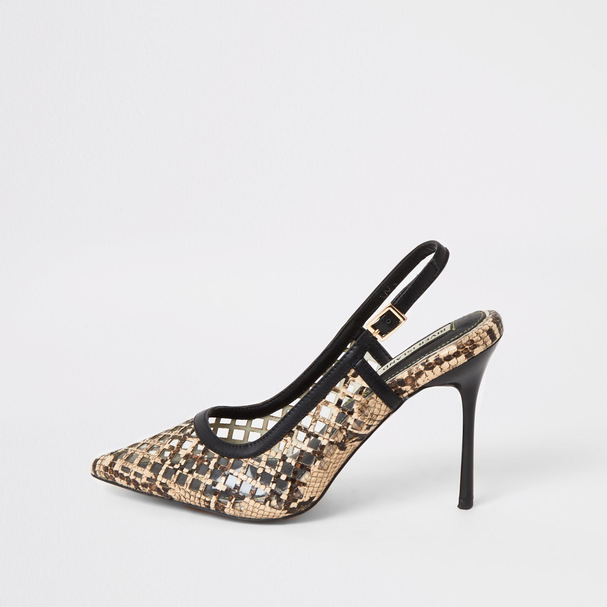 snake print perspex heels