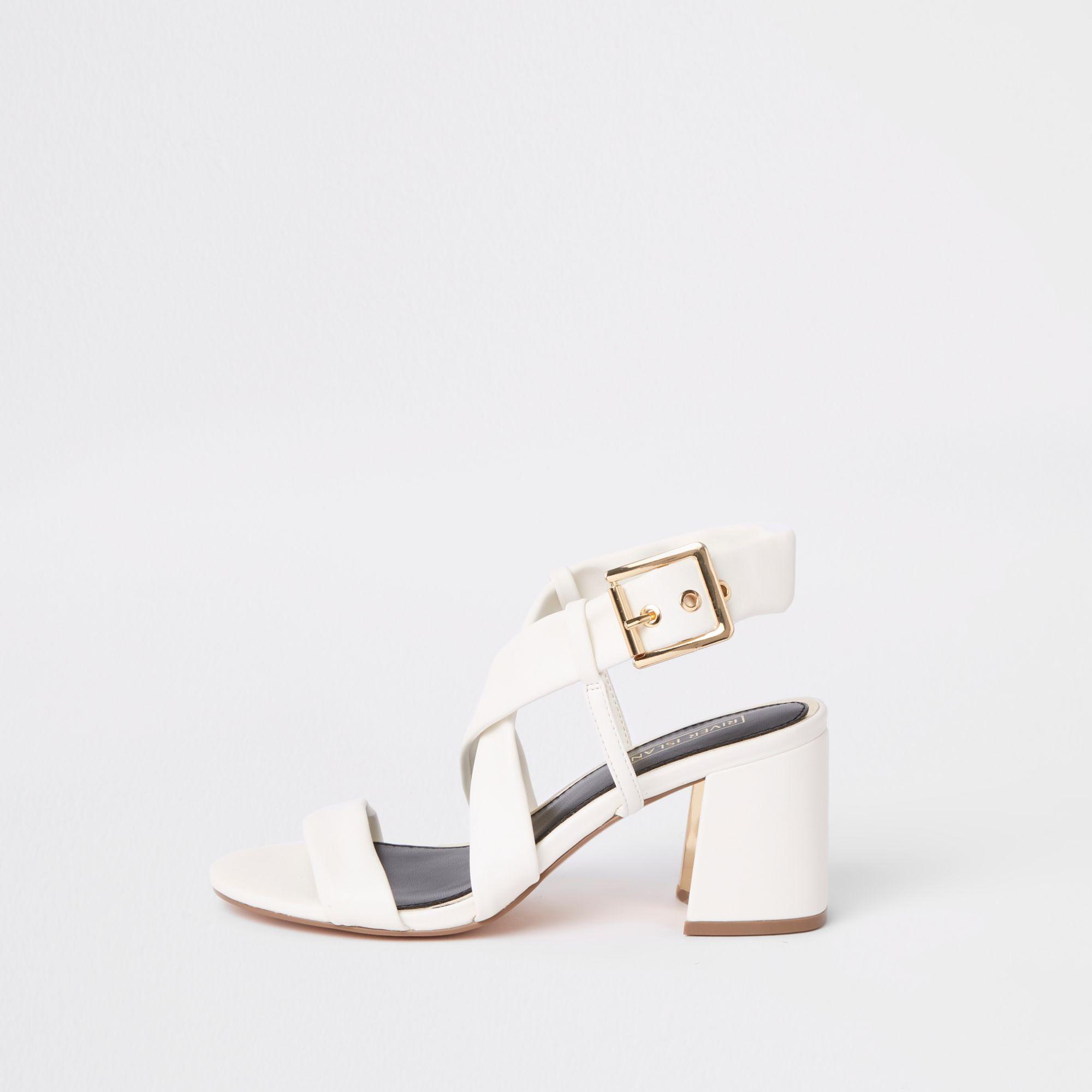 white strappy block heel sandals
