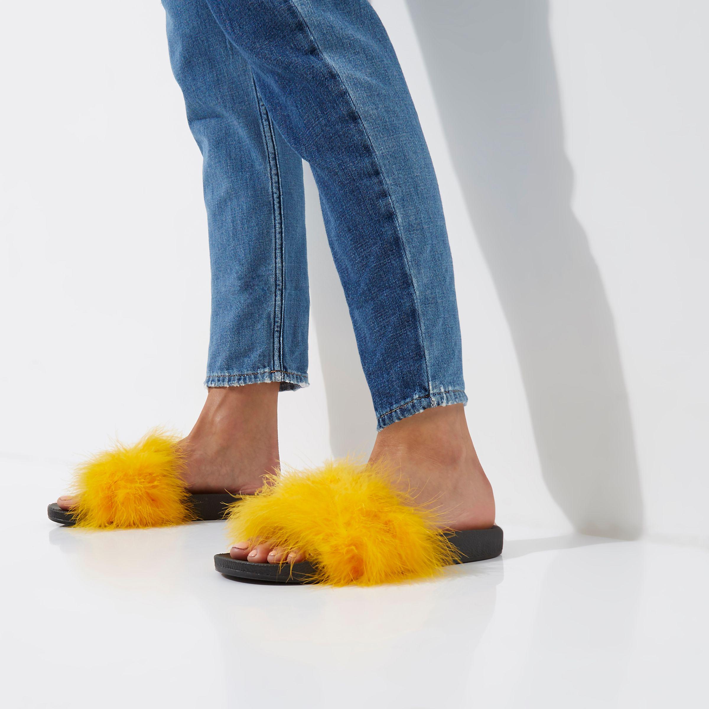 yellow fluffy sliders