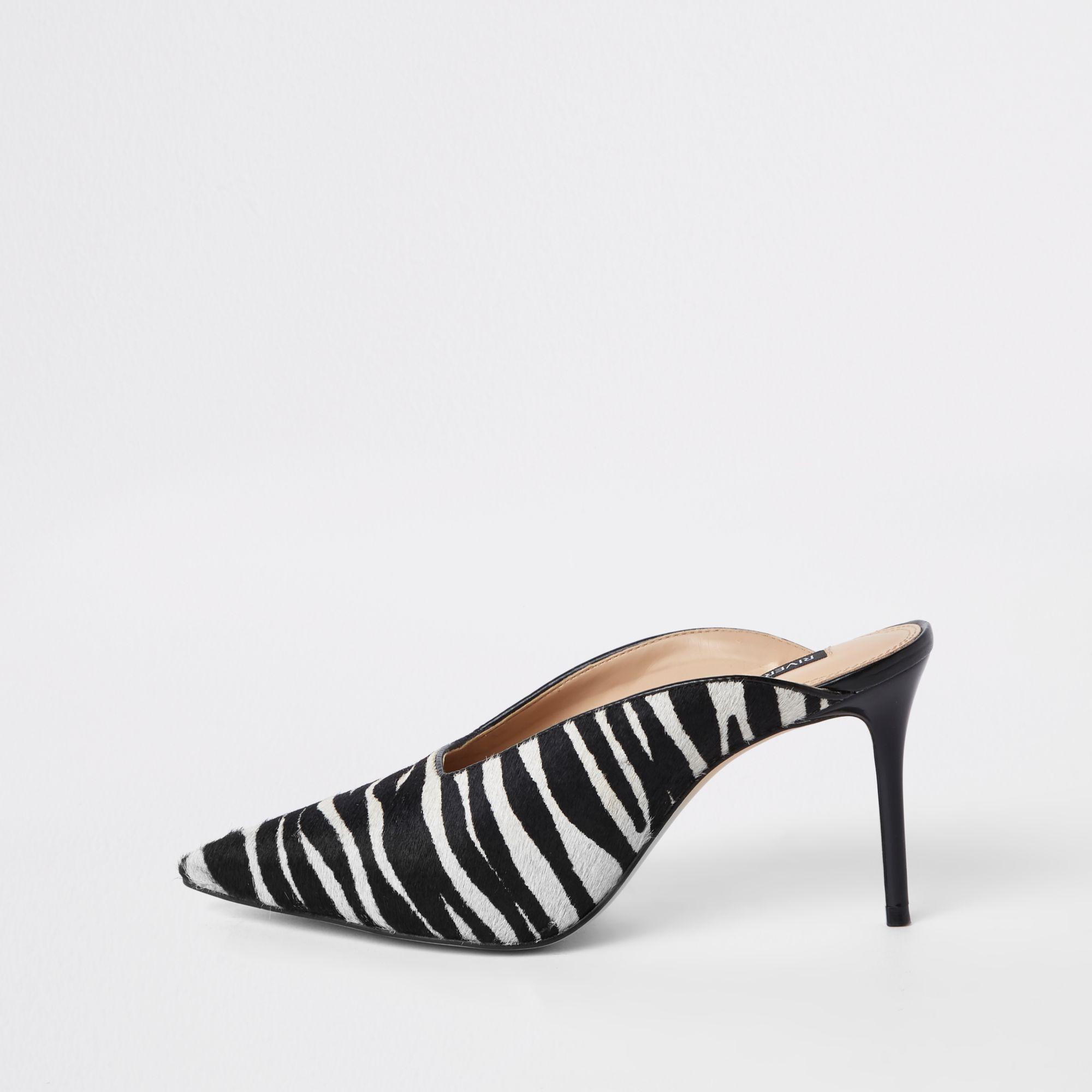 CHRISTIAN LOUBOUTIN 7 Black and White Zebra Print Calf Hair Slingback Pumps  at 1stDibs | christian louboutin zebra print shoes, zebra print heels, zebra  slingback heels