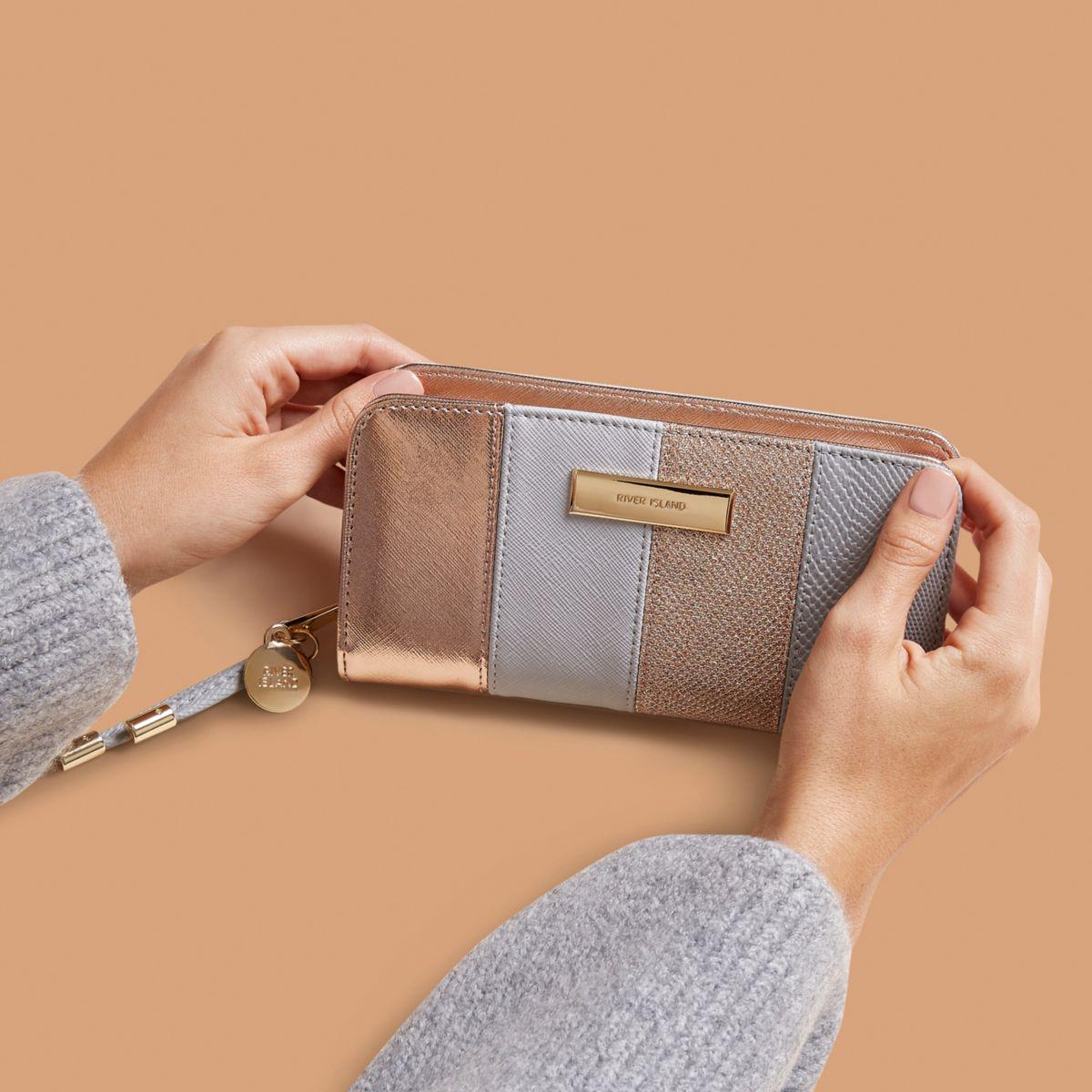 grey and rose gold purse