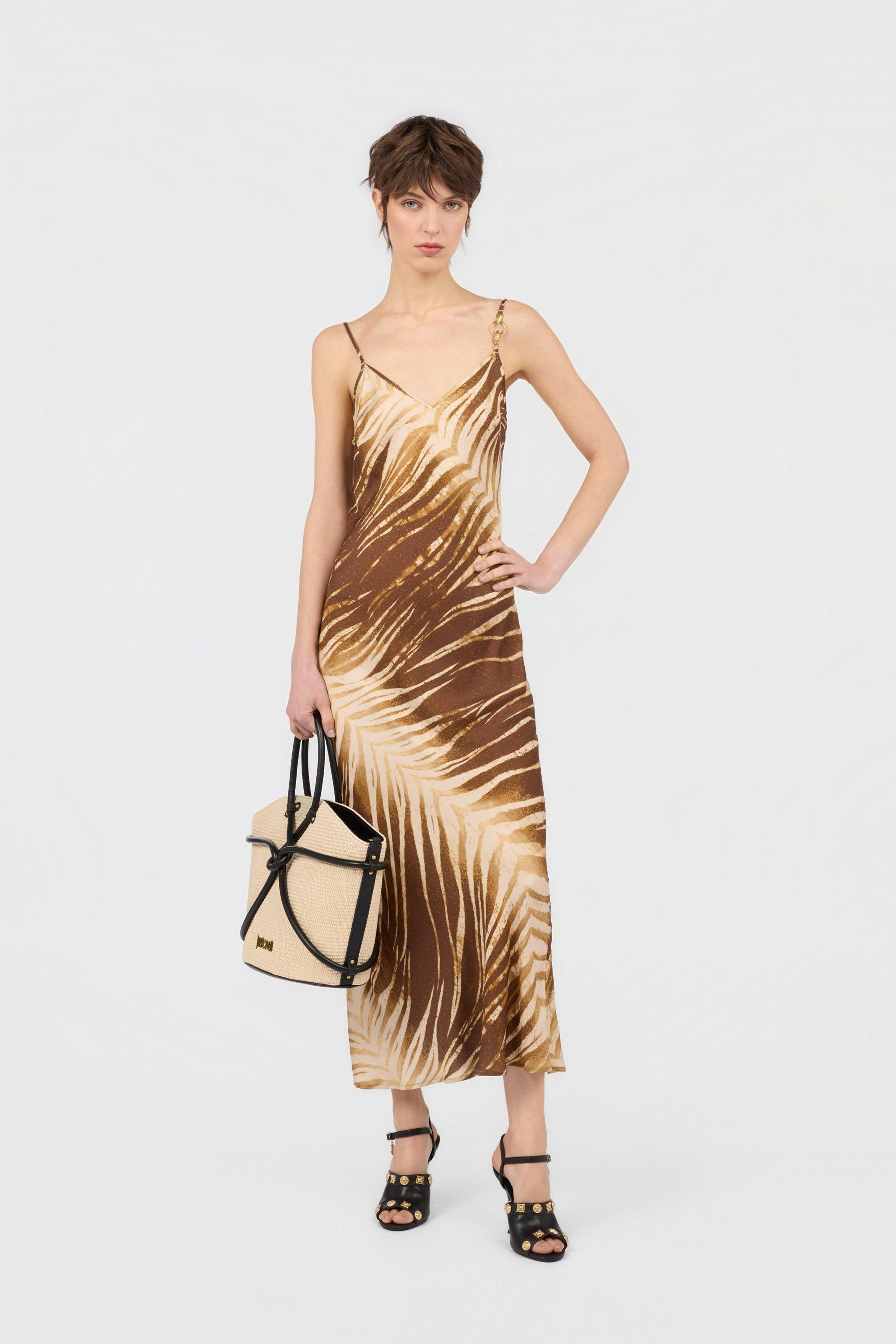 dress made of metal ONE OF A KIND MINI DRESS WITH METAL HARDWARE – AKIRA