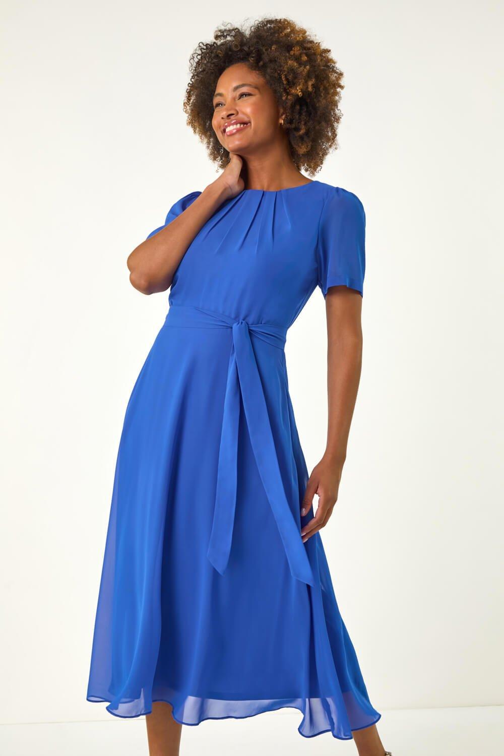 roman fit and flare dresses Joseph Ribkoff Fit & Flare Pleated Dress with Knot Waist Detail Style –  DECABANA main image 0