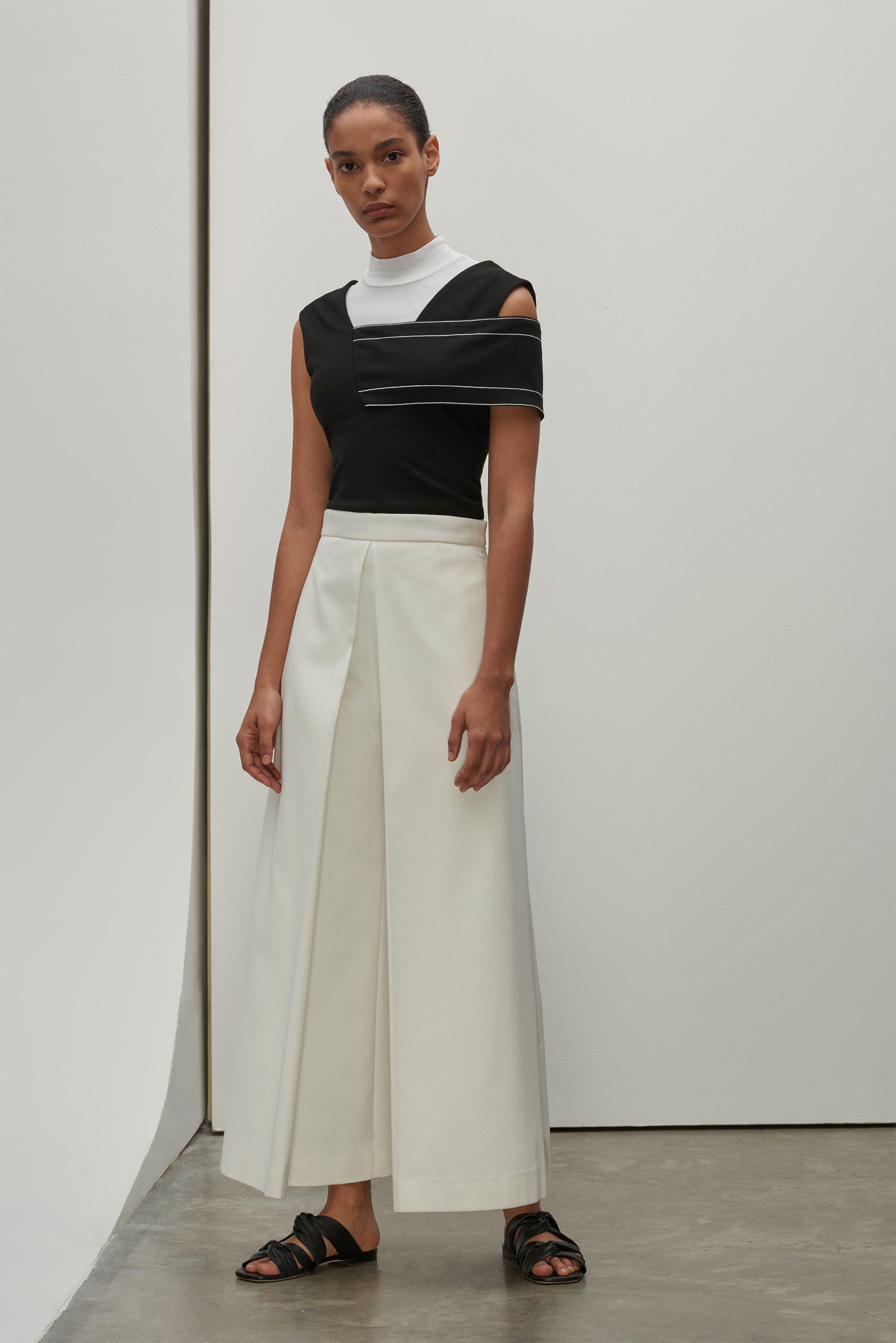 white cotton sleeveless turtleneck