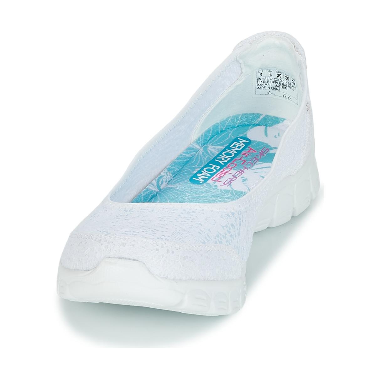 white skechers slip on trainers