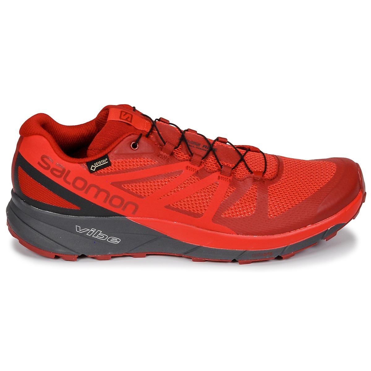 salomon red trainers