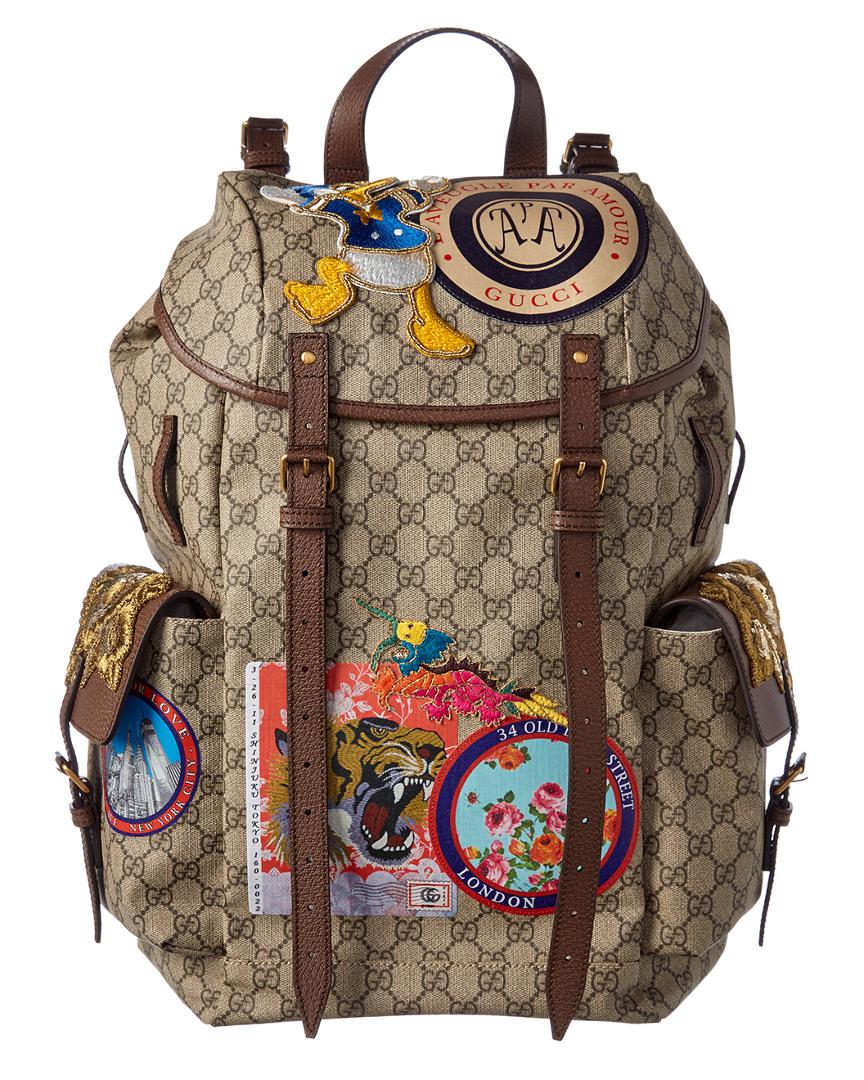 Gucci Gg Supreme Canvas Donald Duck Appliqué Backpack - Lyst