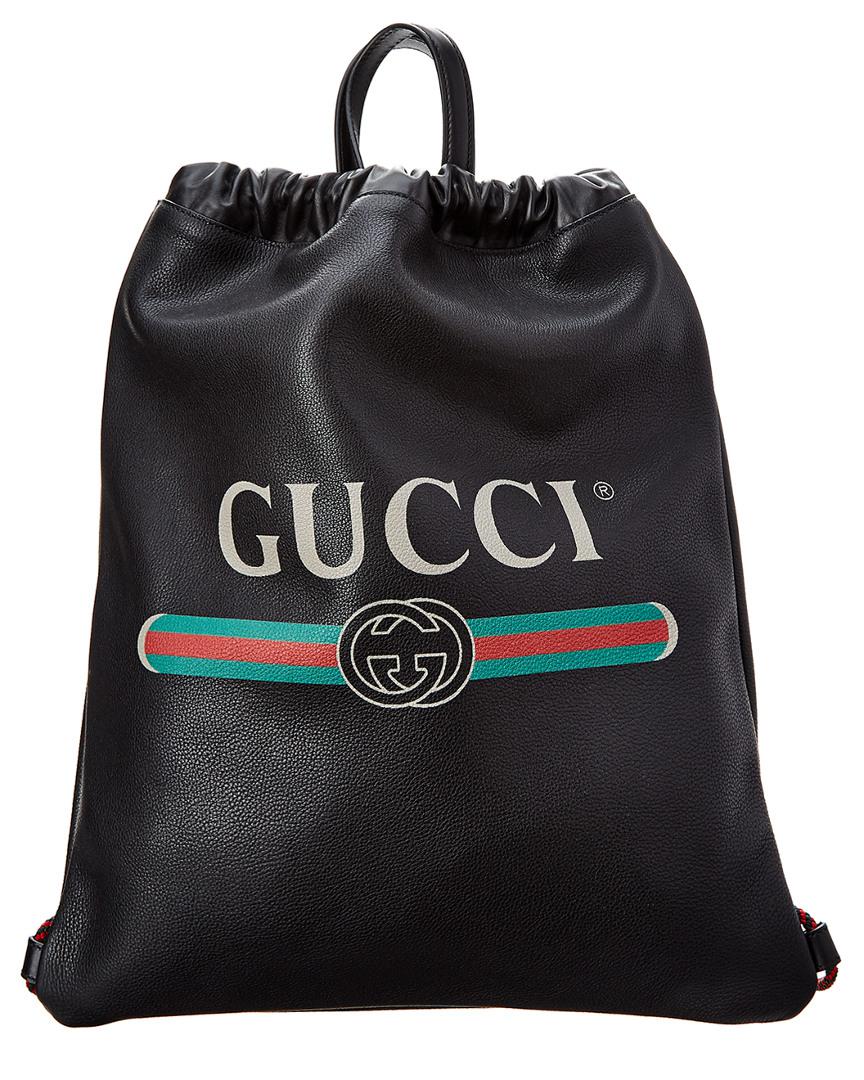 gucci print leather drawstring backpack