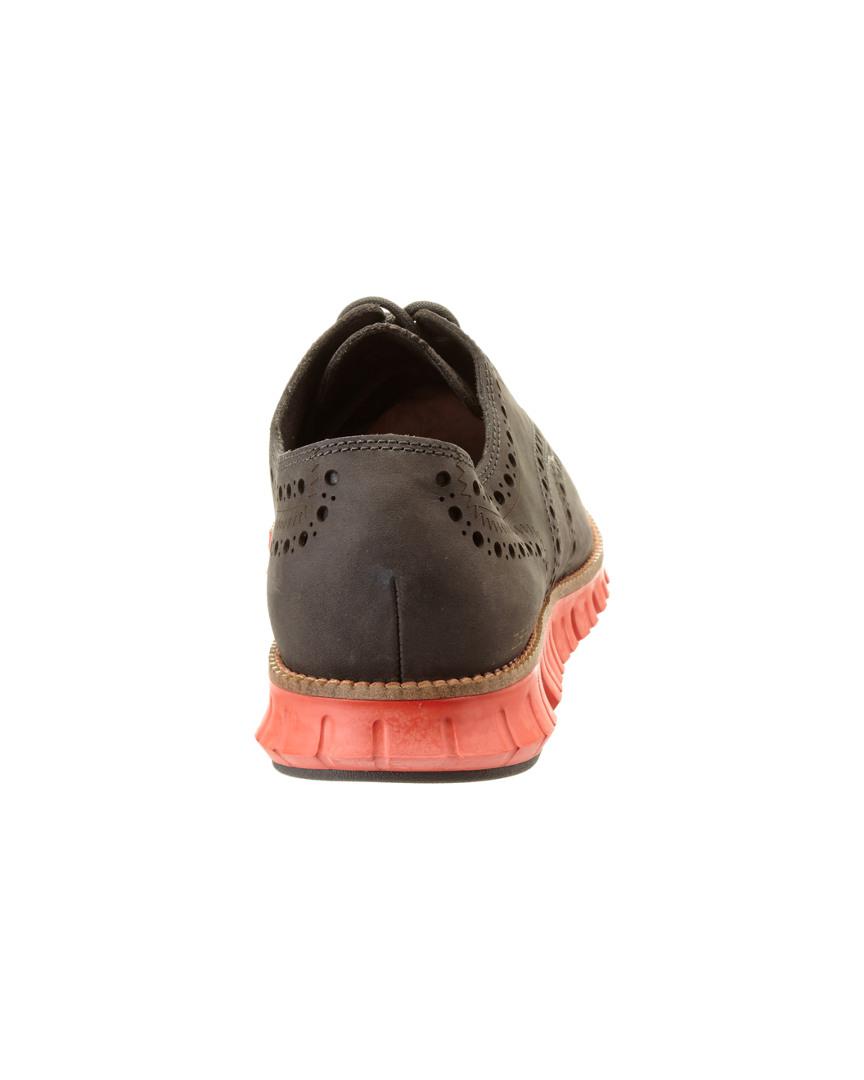 orange wingtip shoes