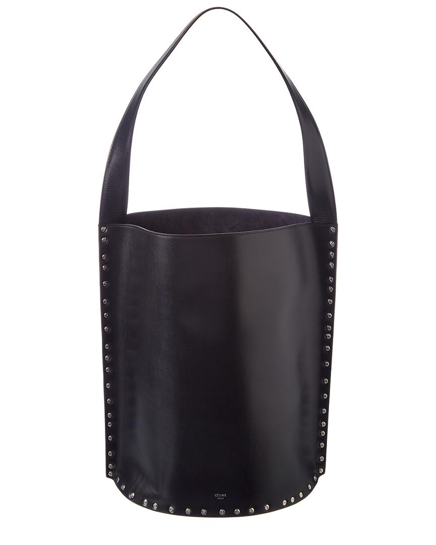 Céline Céline Large Studs Satinated Leather Bucket Bag in Black - Lyst