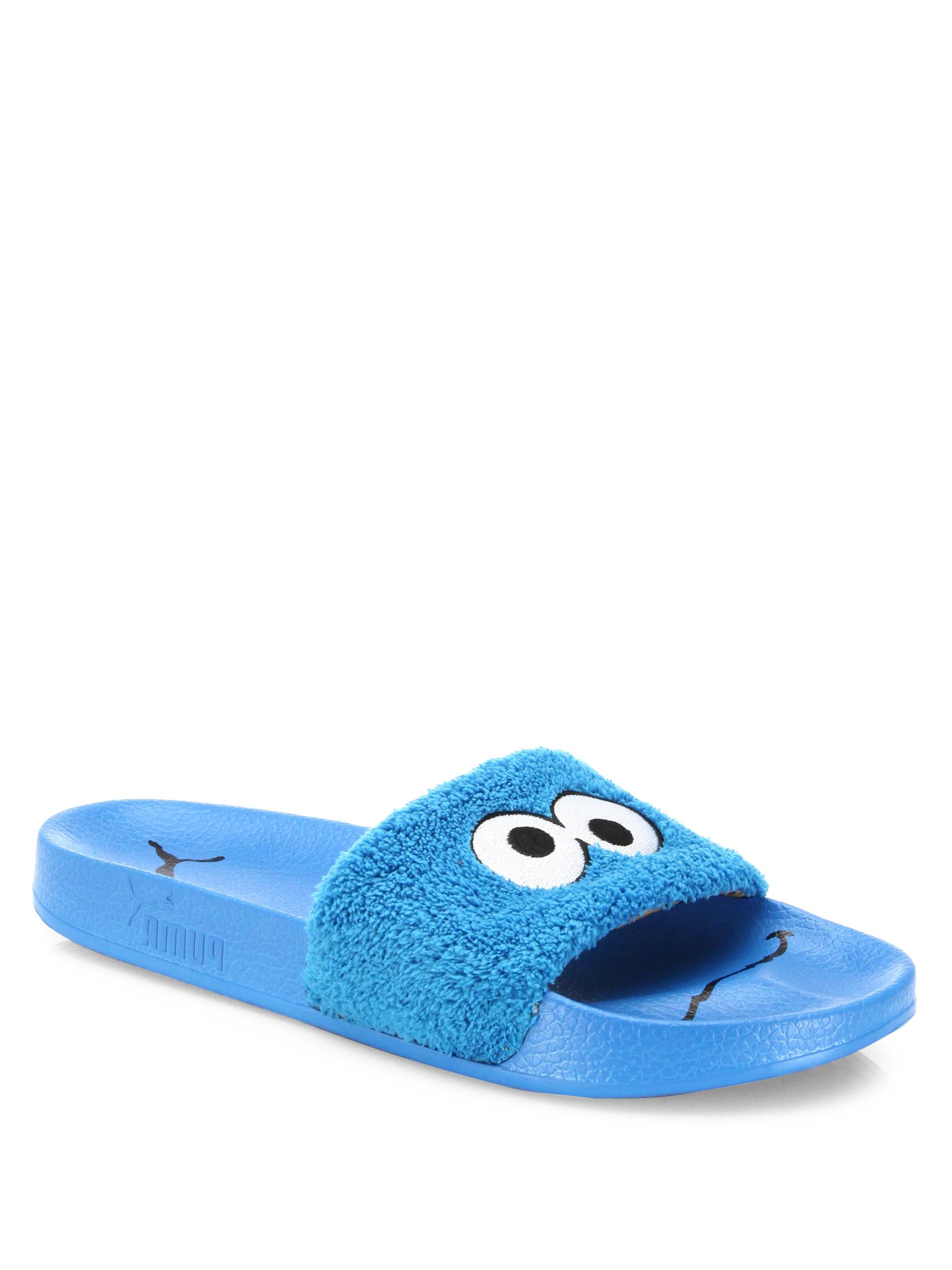 blue puma slides